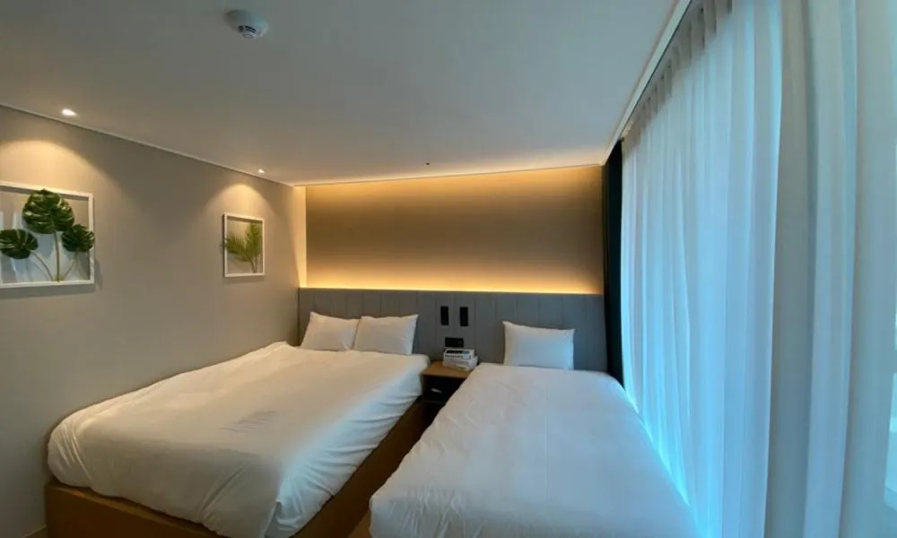 Bed in D OV Haeundae Hotel