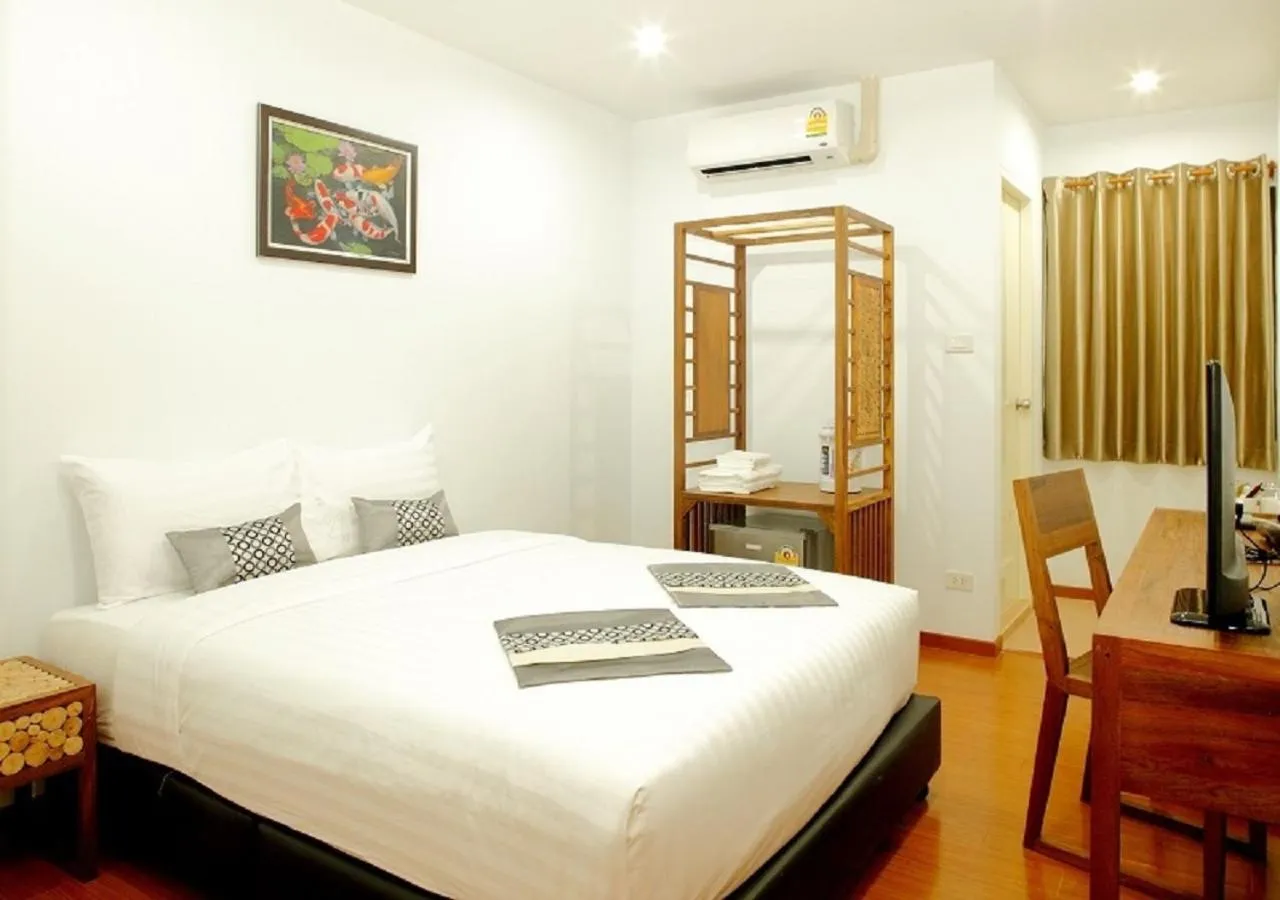 Bed in Double DD House at MRT Sutthisarn