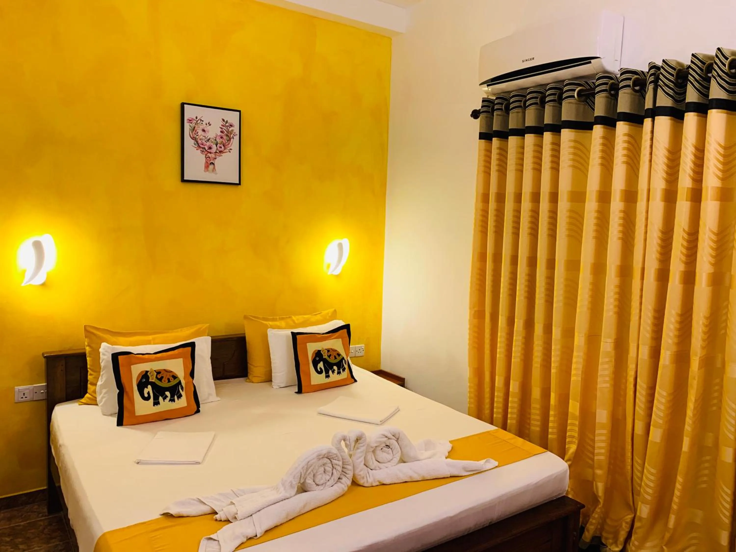 Bed in Sam's Guest House