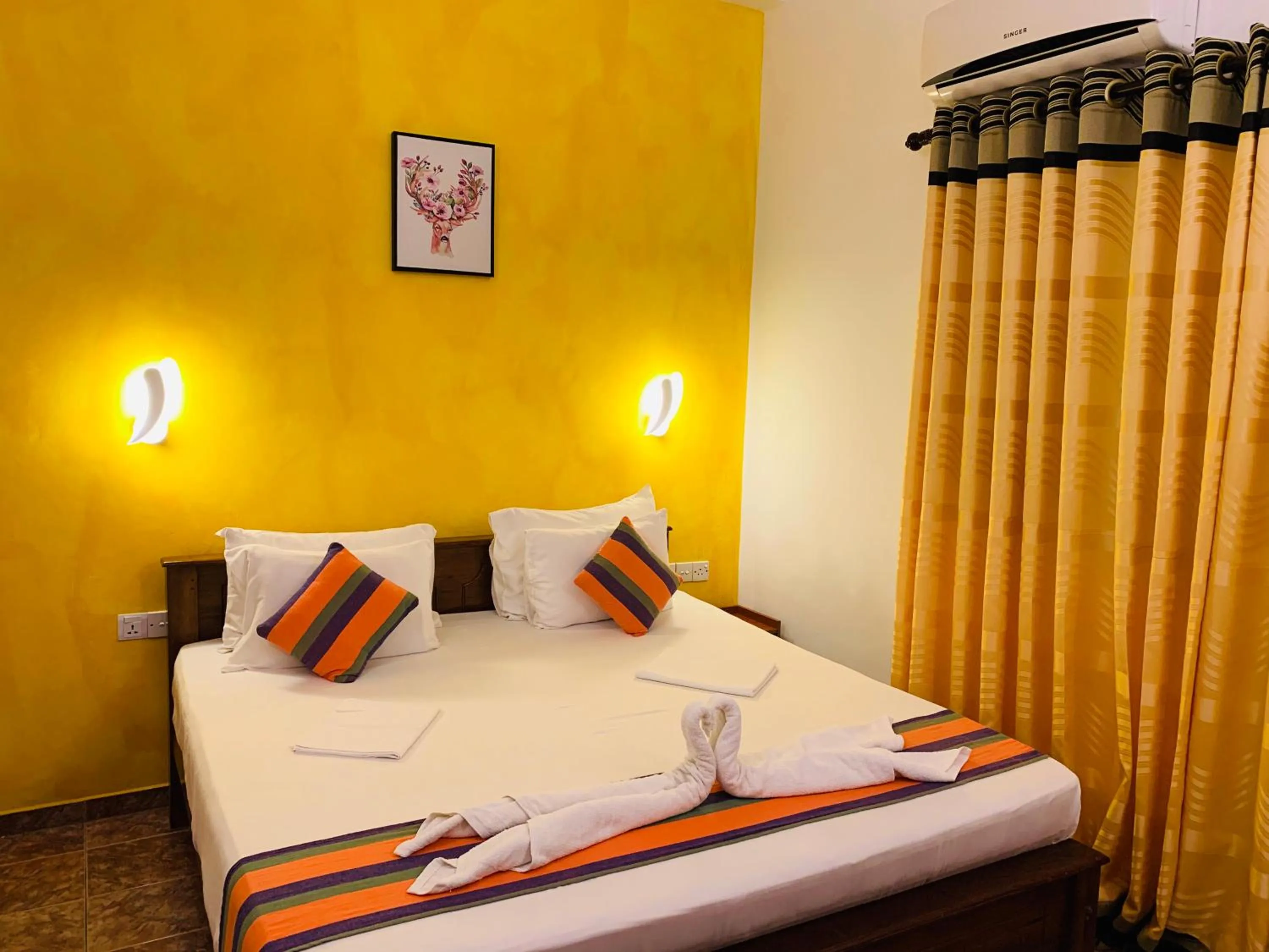 Bed in Sam's Guest House