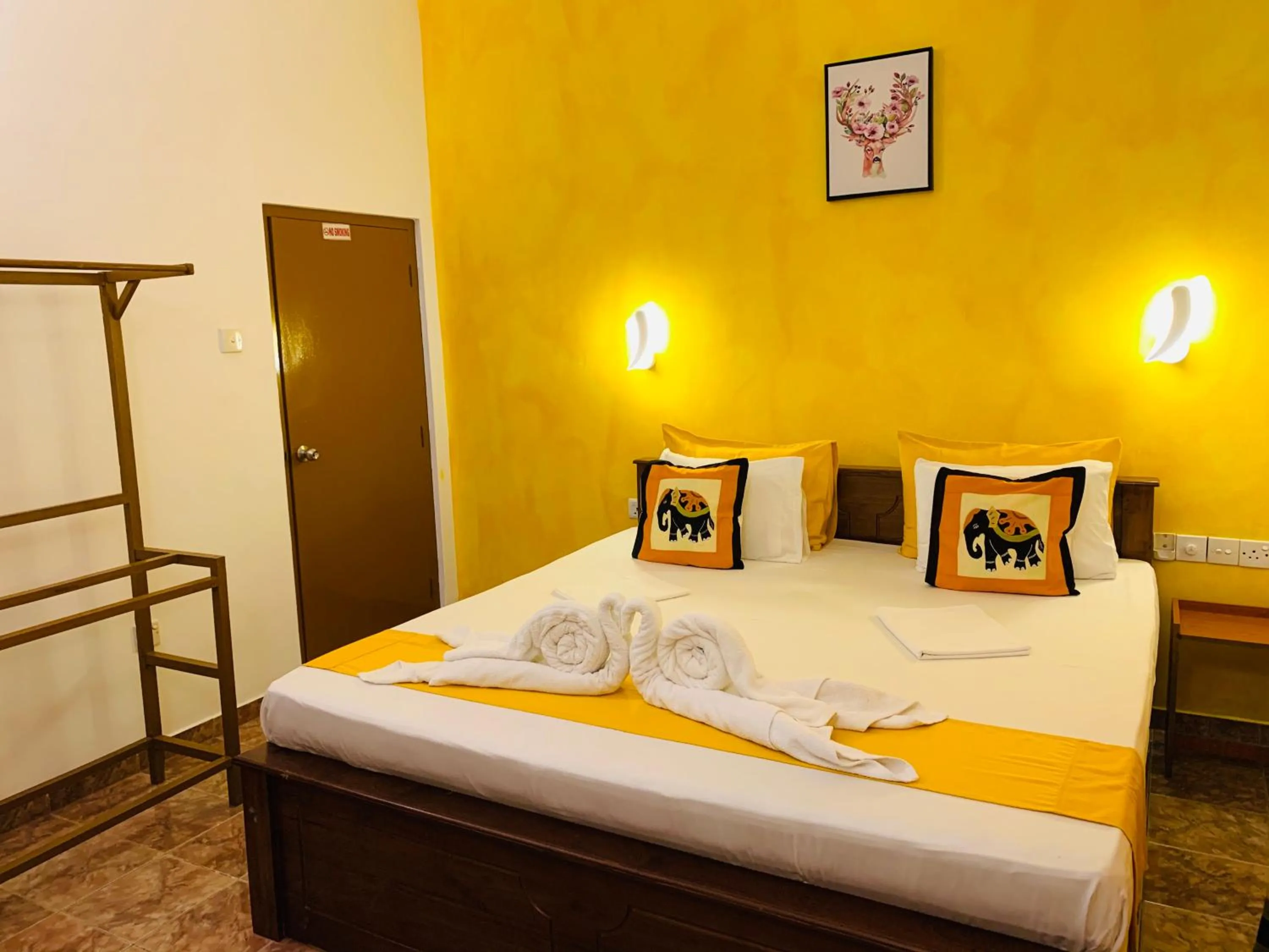 Bed in Sam's Guest House