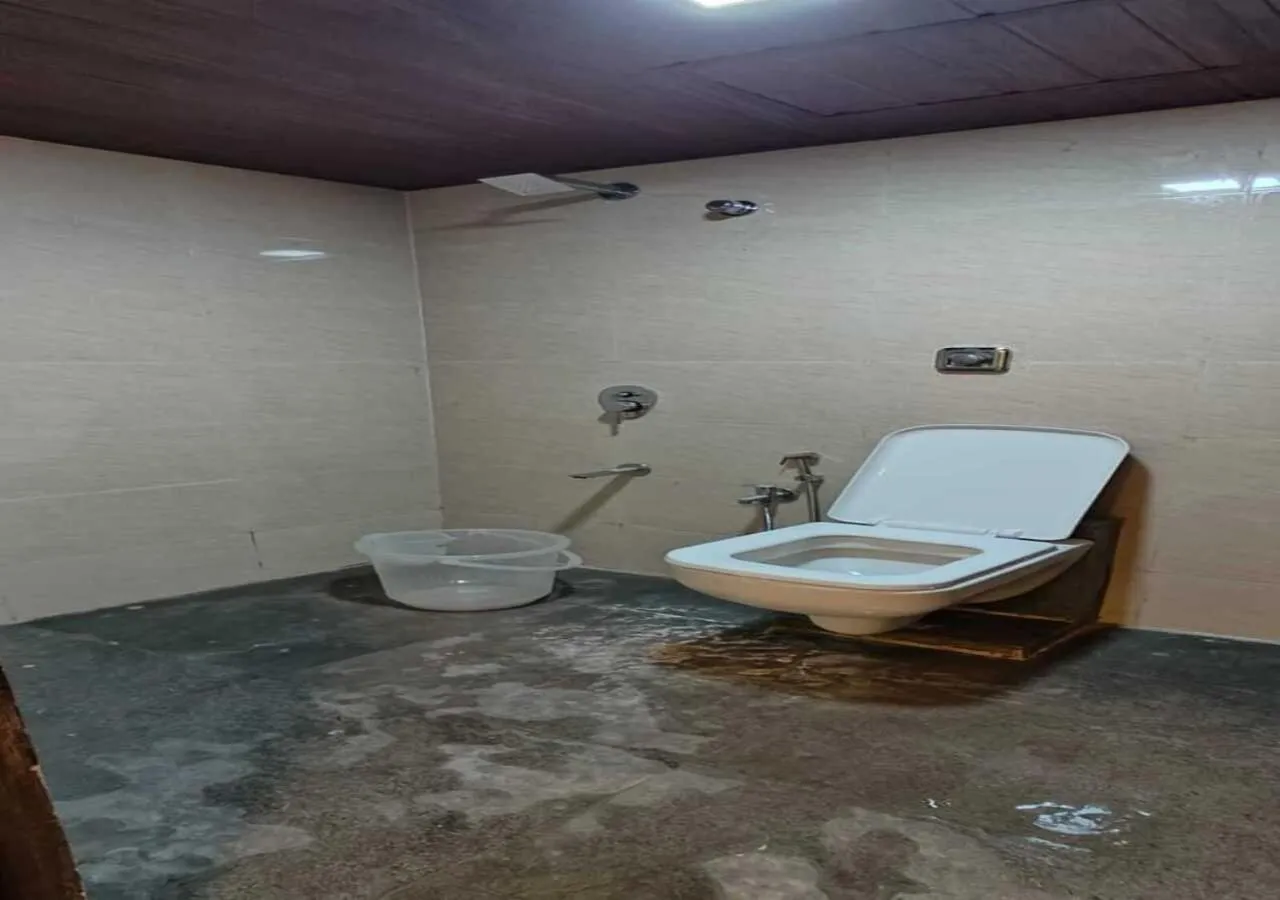 Toilet in Hotel Blue Sky Residency