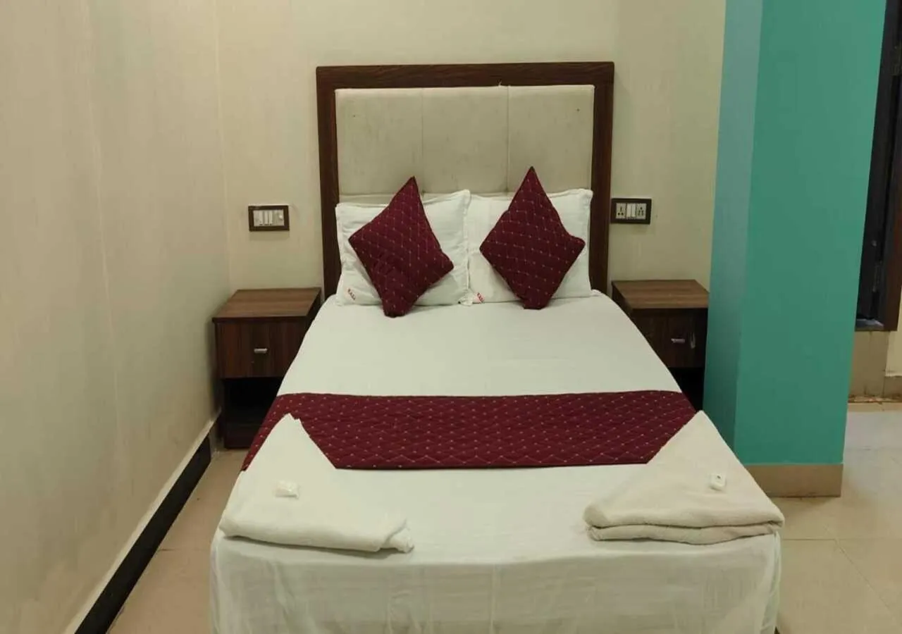 Bed in Hotel Blue Sky Residency