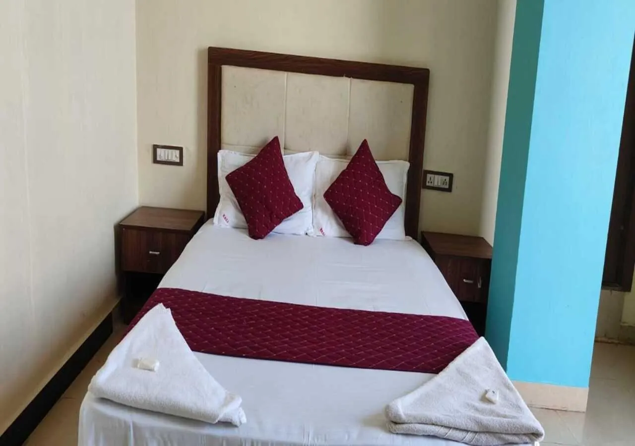 Bed in Hotel Blue Sky Residency