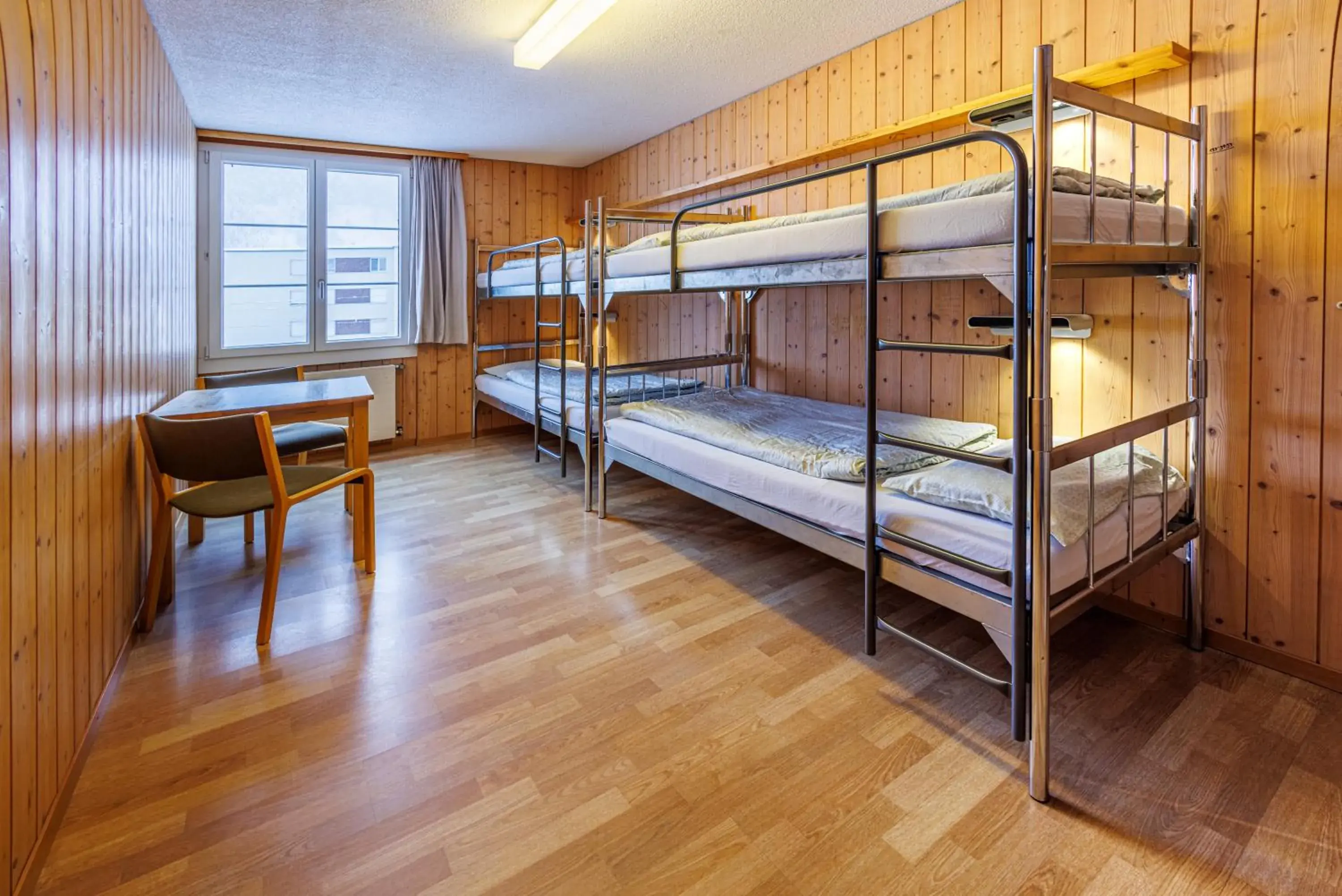 Quadruple Room with Shared Bathroom in Engelberg Youth Hostel Quadruple Room with Shared Bathroom in Engelberg Youth Hostel