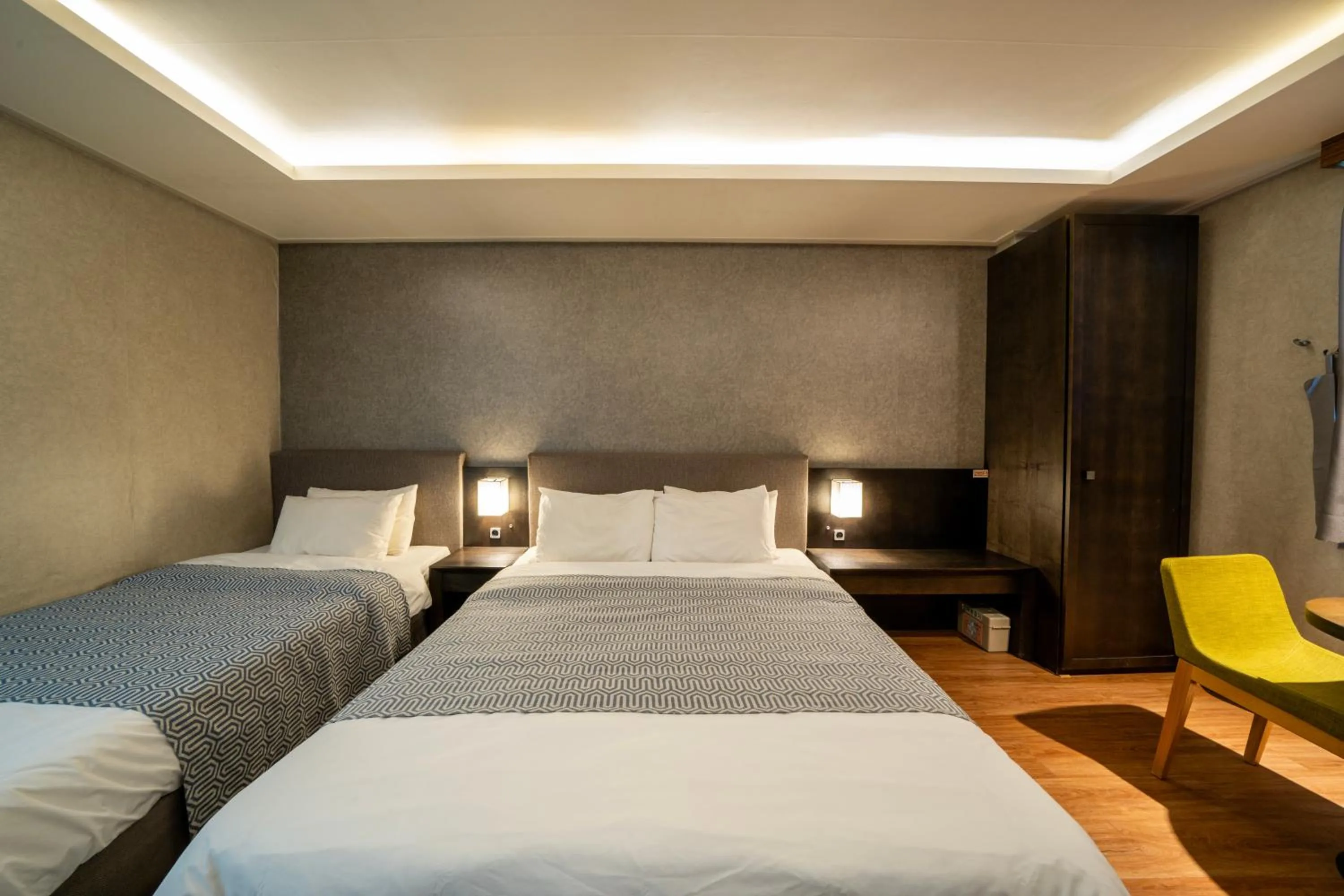 Bed in I-check Hyunjin Hotel