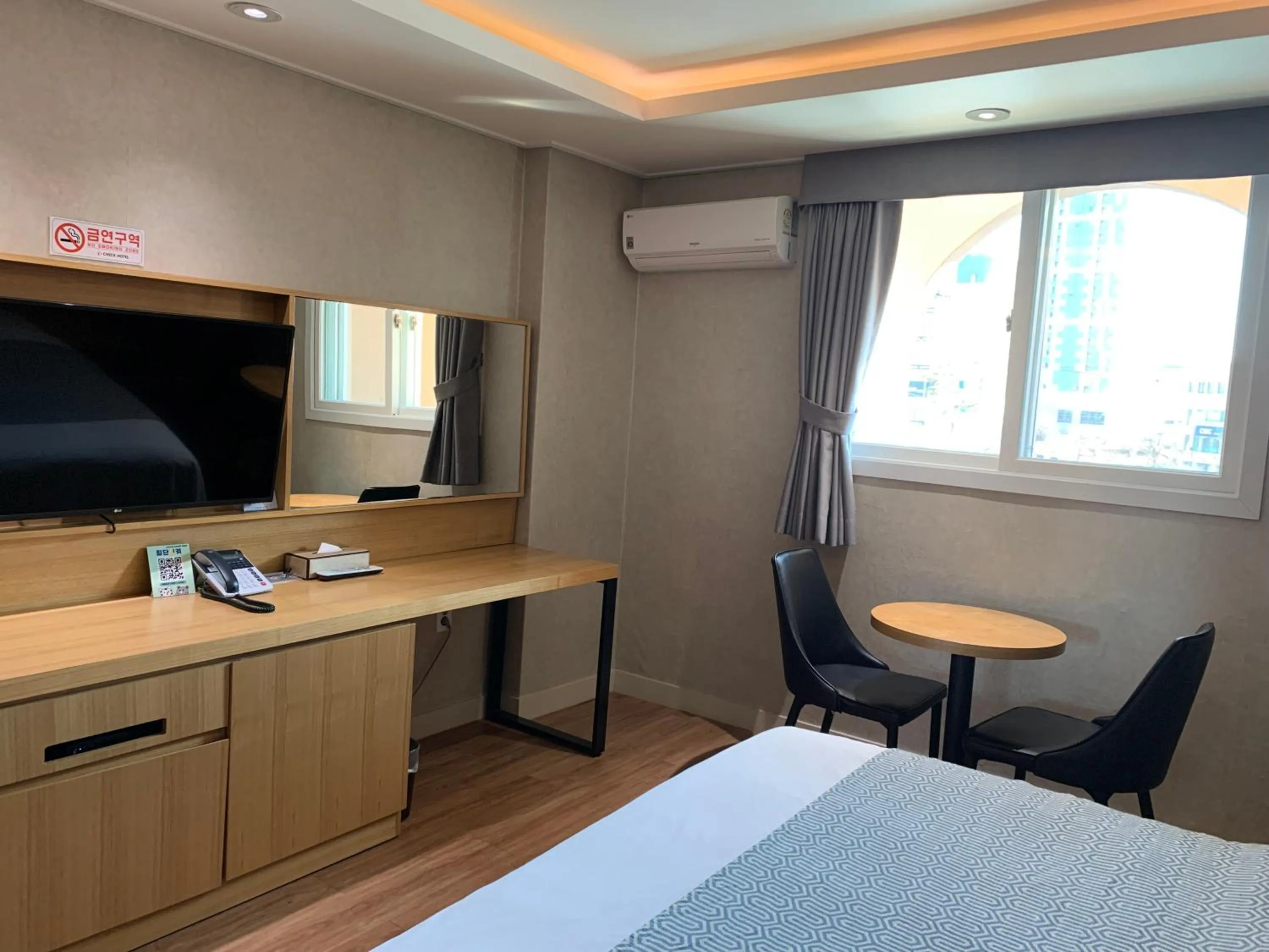 Bed in I-check Hyunjin Hotel