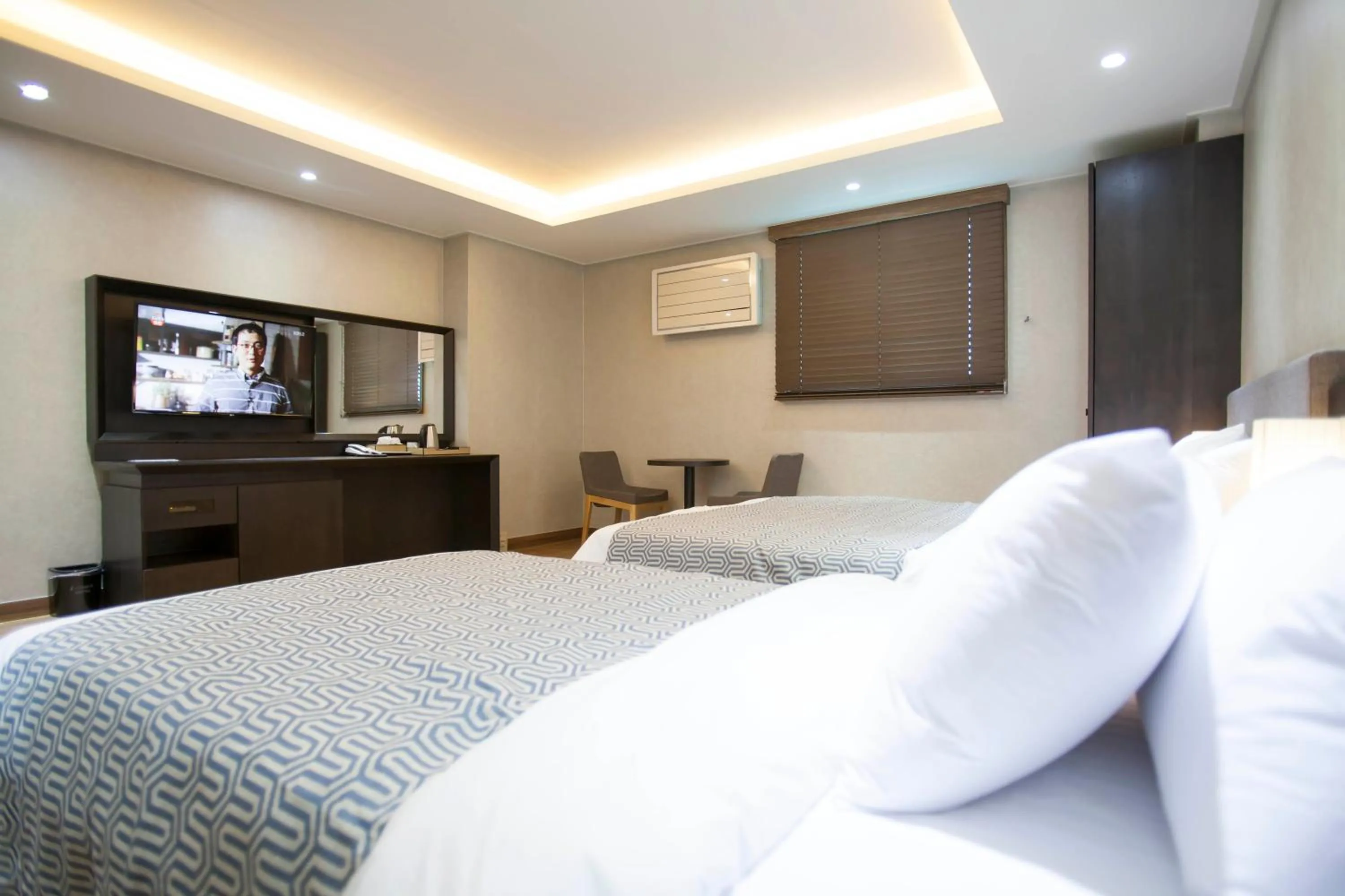 Bed in I-check Hyunjin Hotel