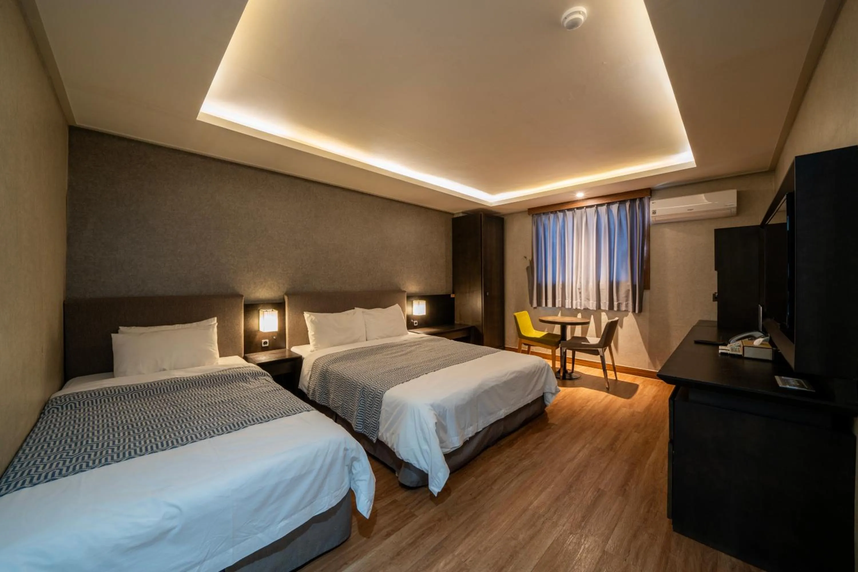 Bed in I-check Hyunjin Hotel