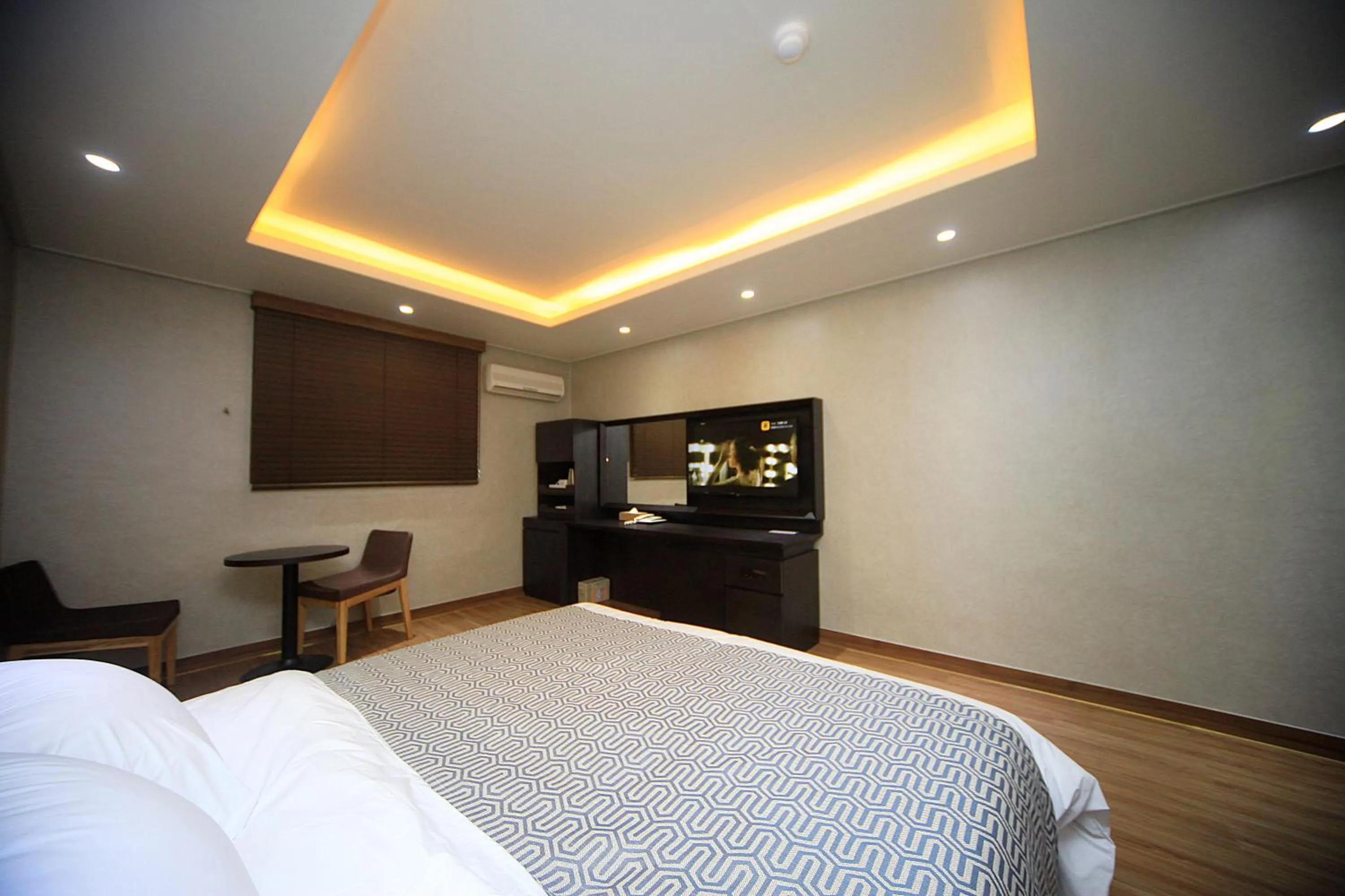 Bed in I-check Hyunjin Hotel