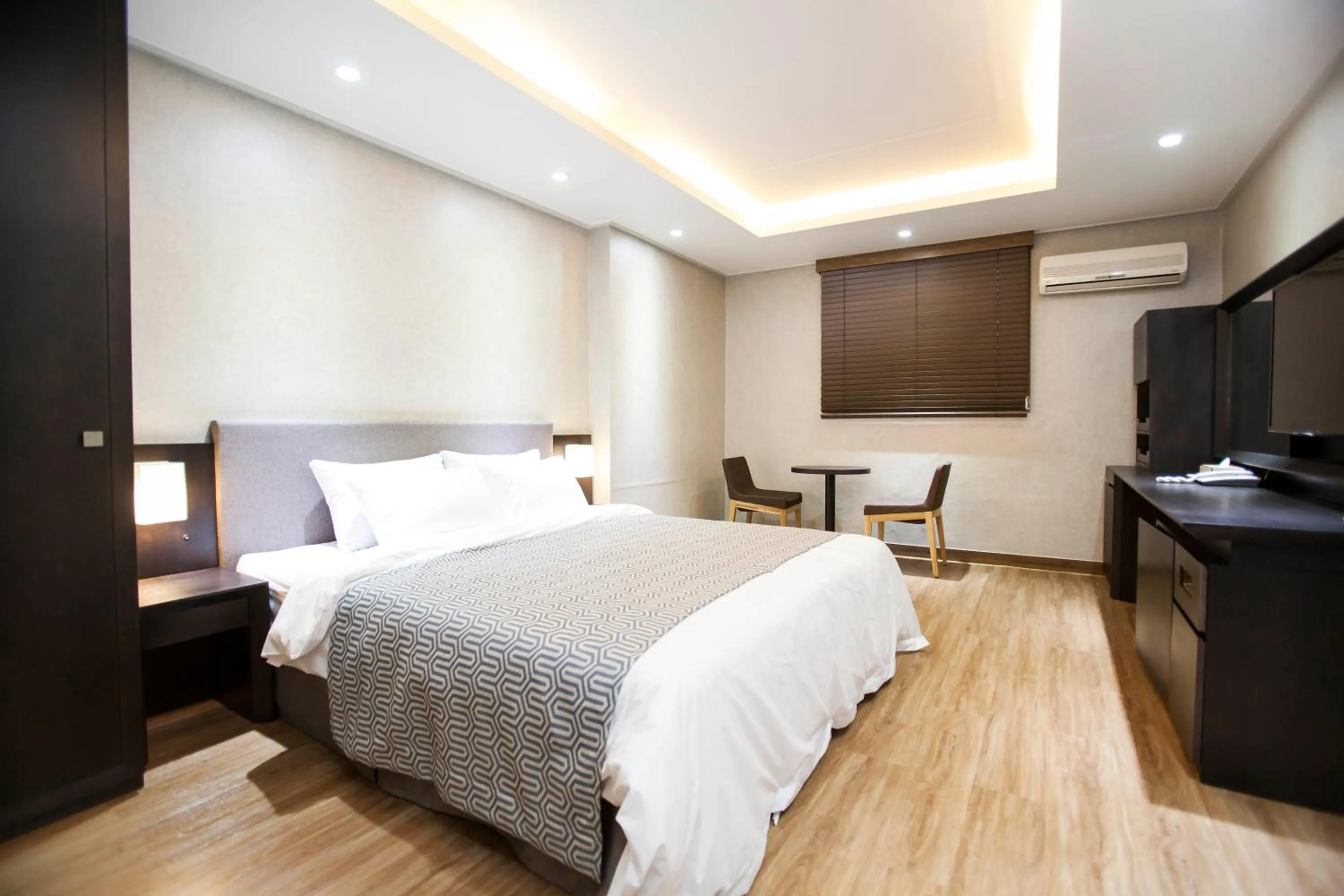 Bed in I-check Hyunjin Hotel