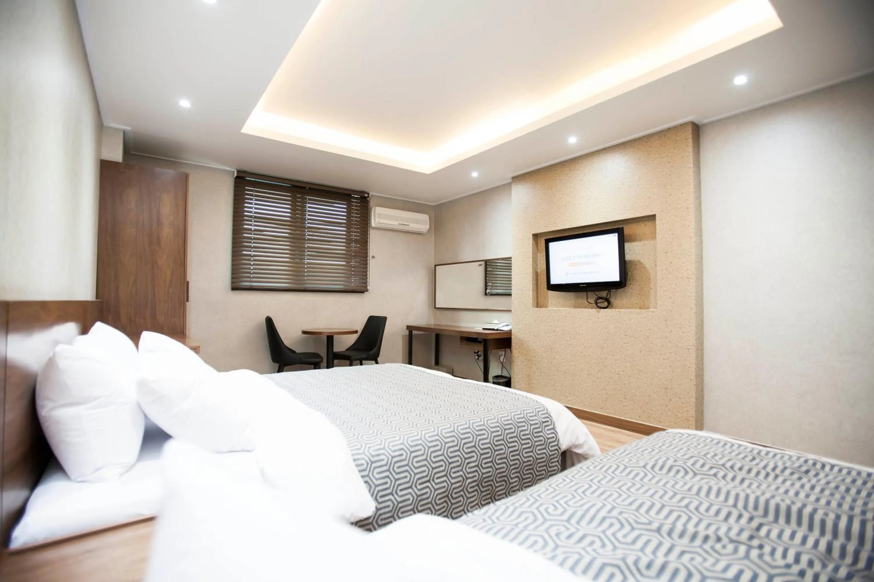 Bed in I-check Hyunjin Hotel