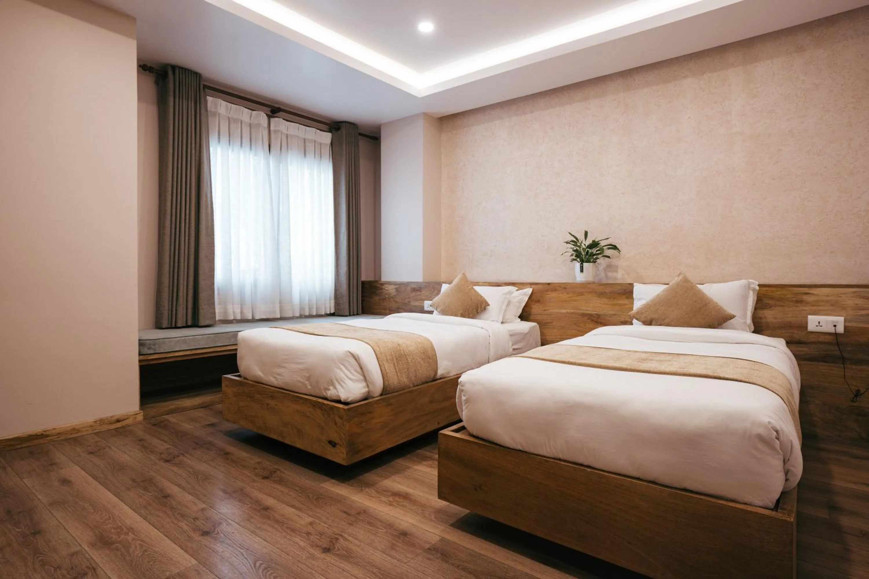 Bed in HOTEL BHRIKUTI TARA