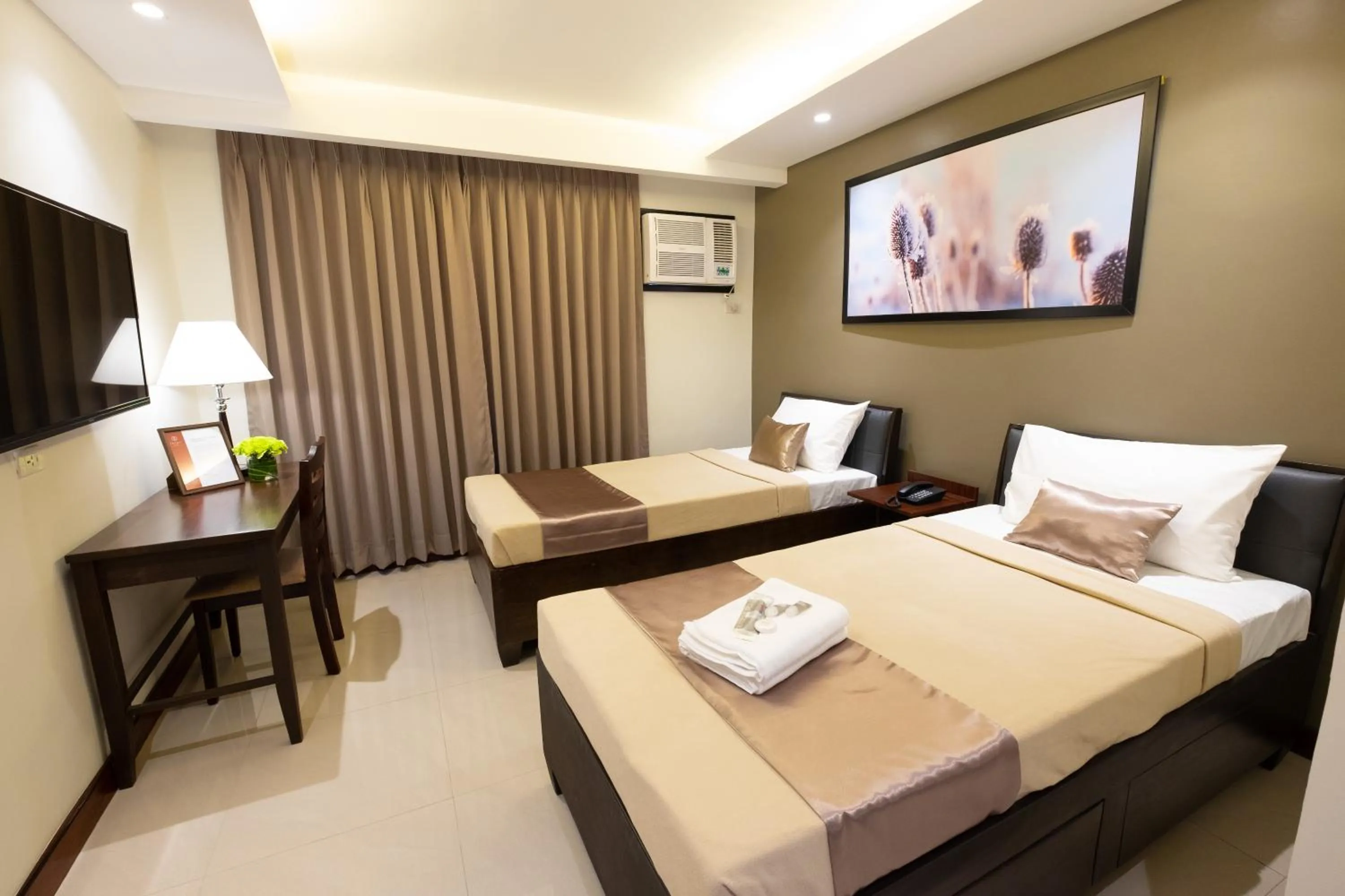 Bed in Soleil Suites Cebu