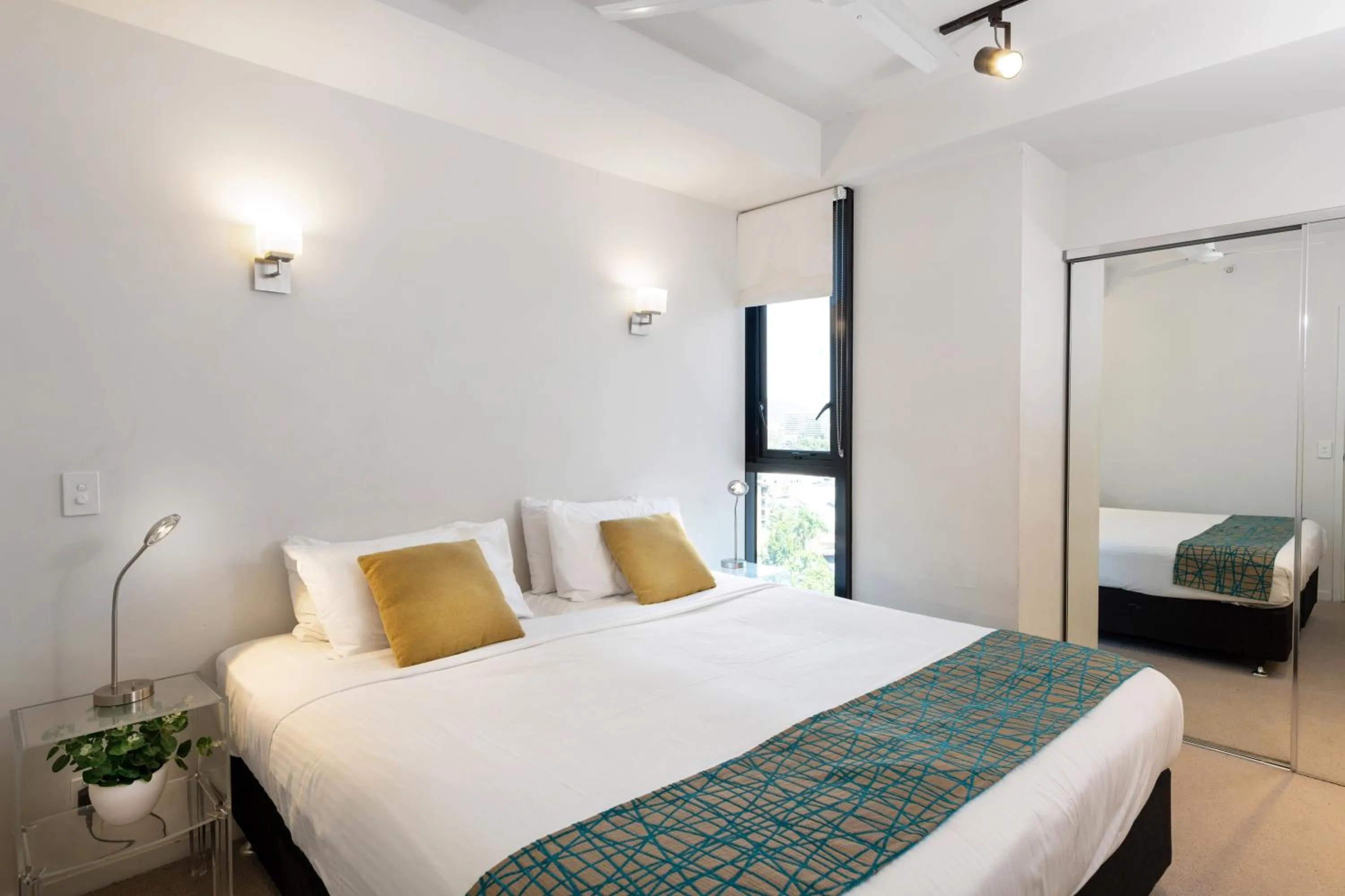 Bed in Arena Apartments by CLLIX