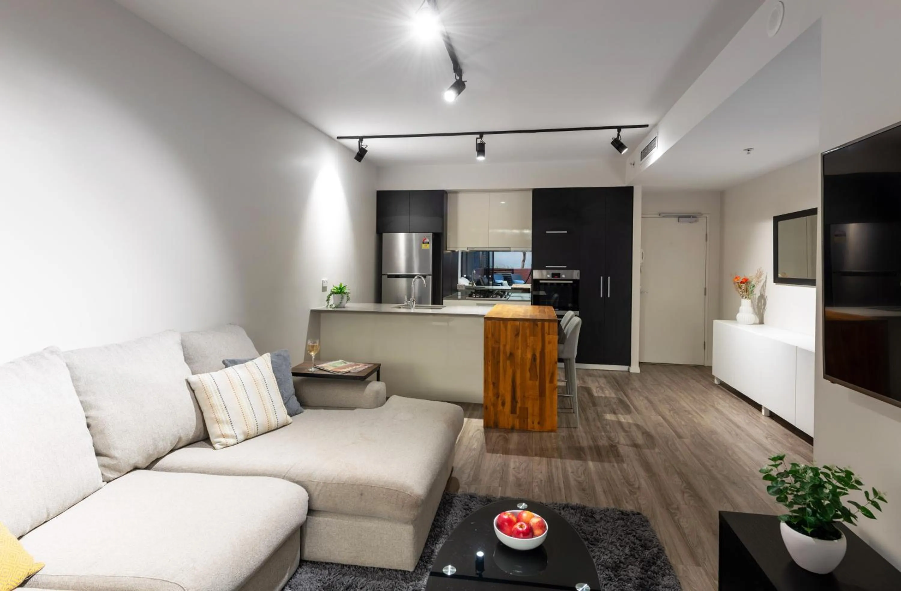 TV and multimedia in Arena Apartments by CLLIX