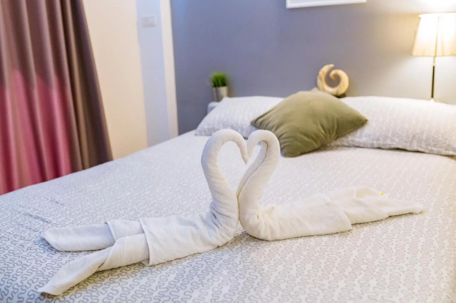 Bed in THE BEACH CHA AM Guest House