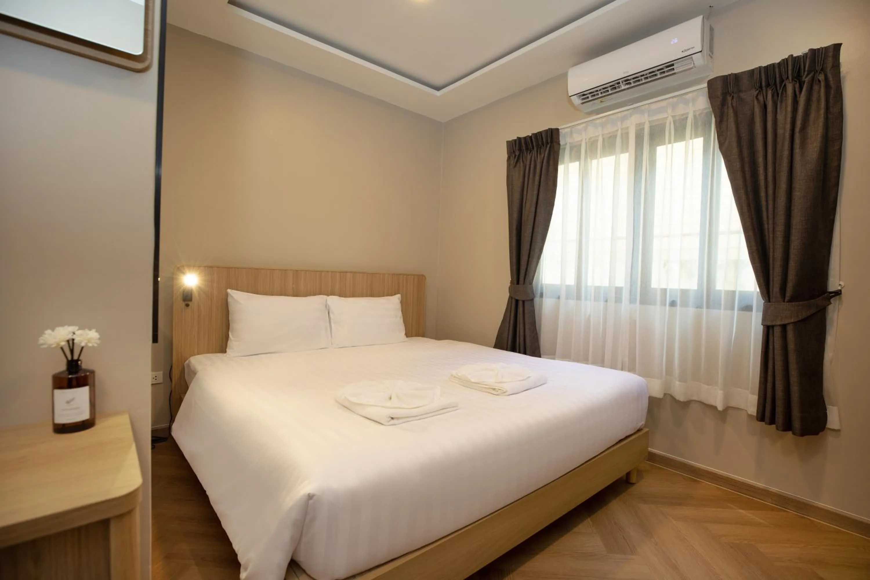 Bed in Tuna Boutique Hotel Patong