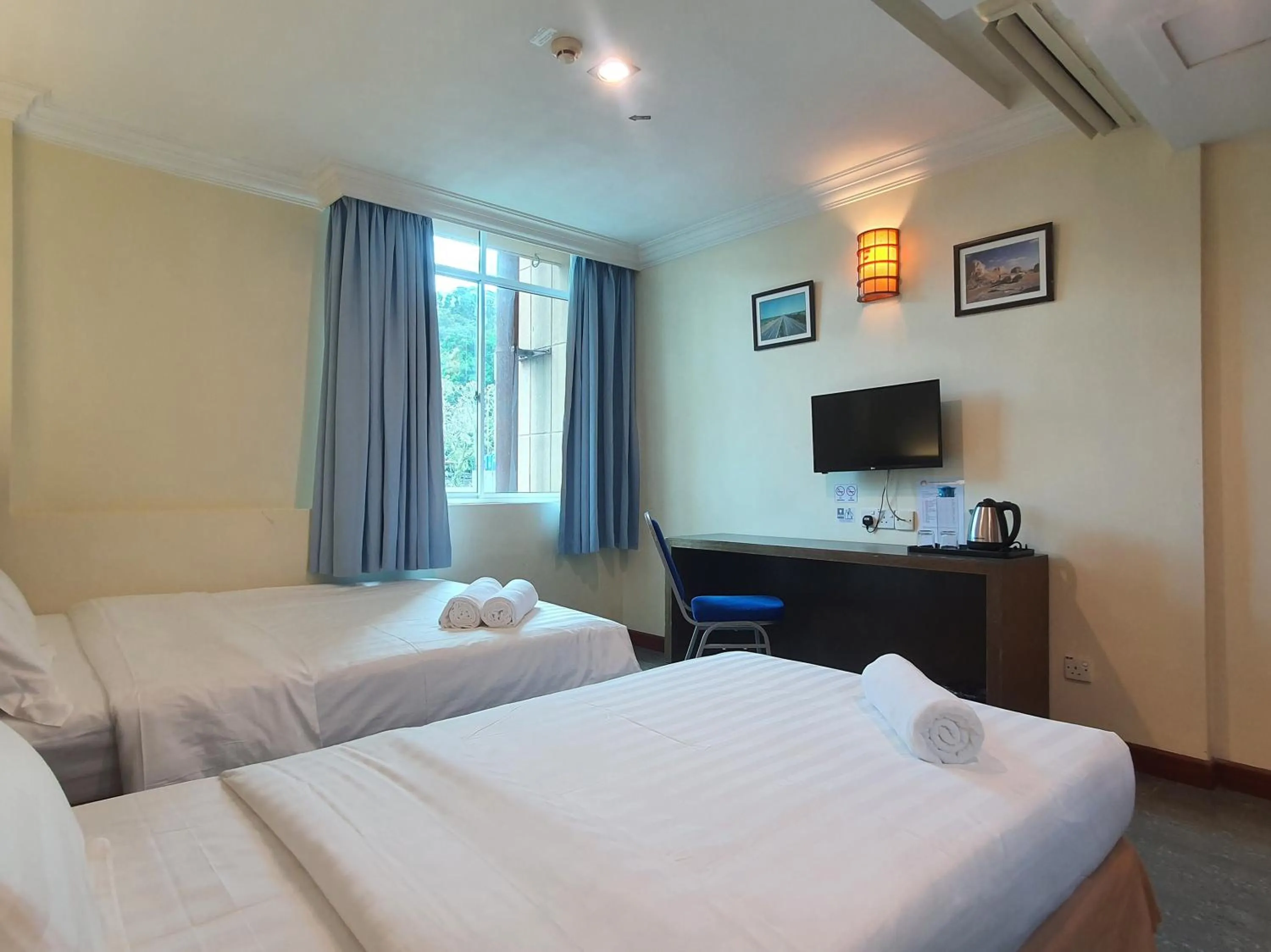 Bedroom, Bed in Capital O 90939 Sandakan Central Hotel