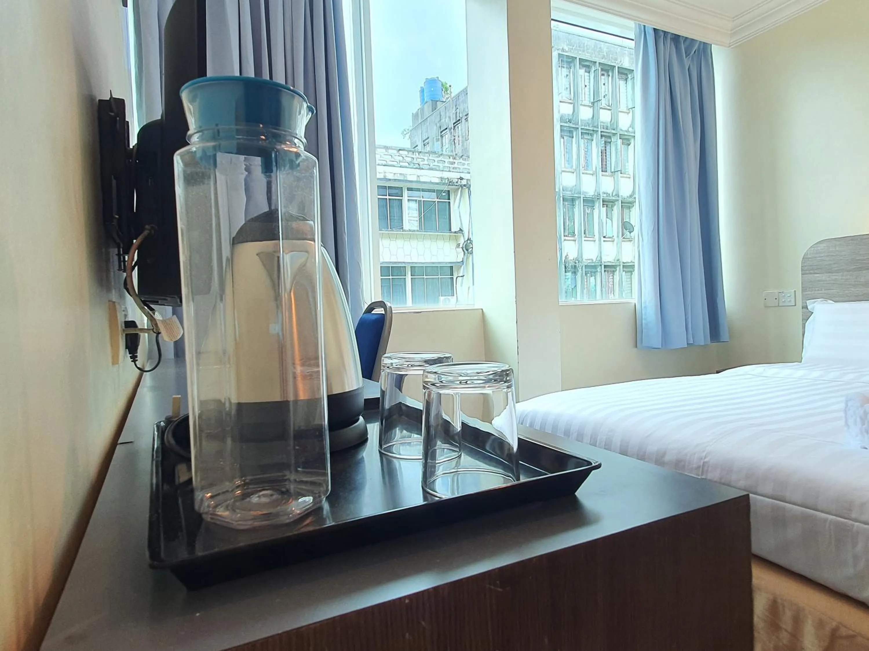 Bedroom, Bed in Capital O 90939 Sandakan Central Hotel