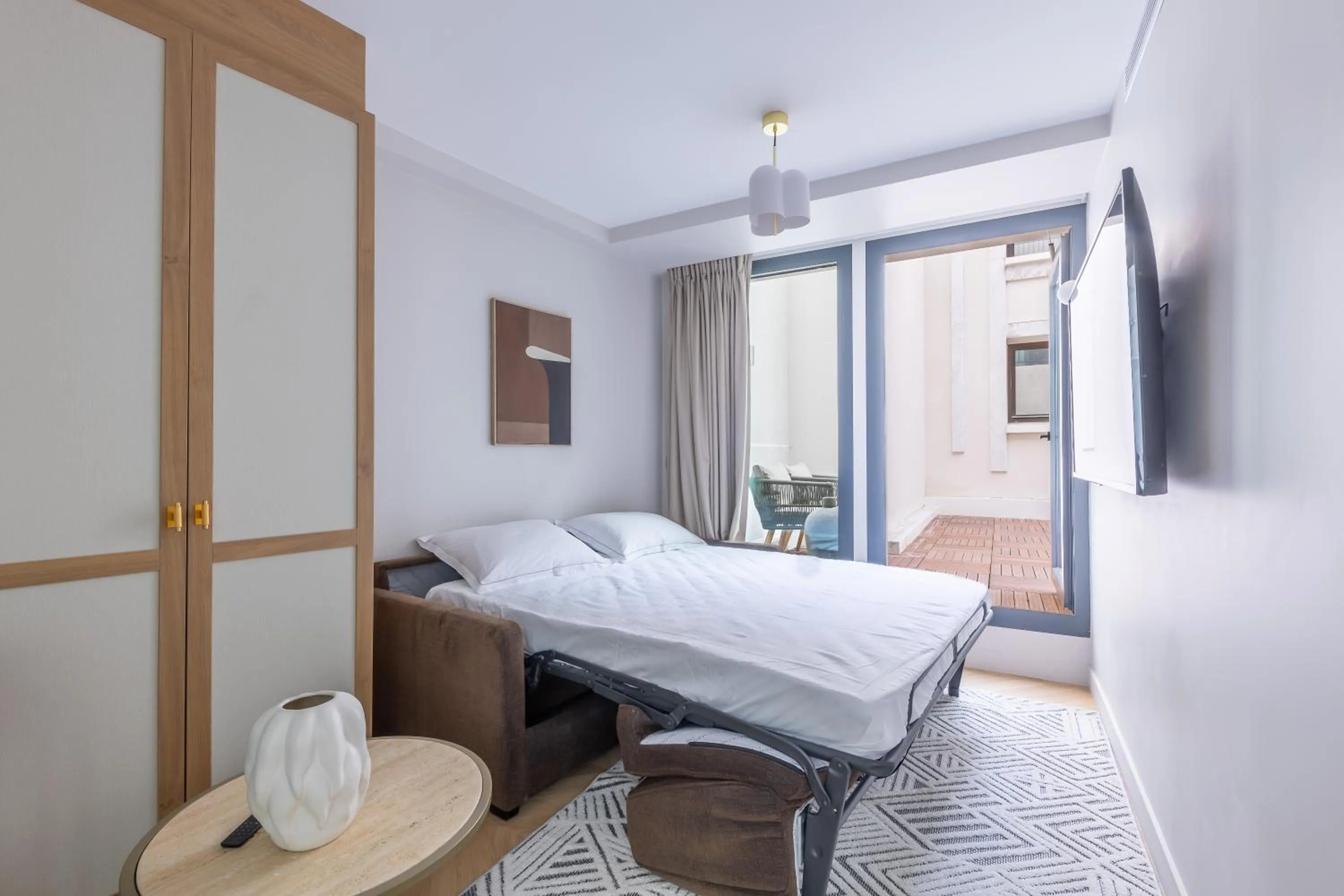 Living room, Bed in Quartier Libre Opera