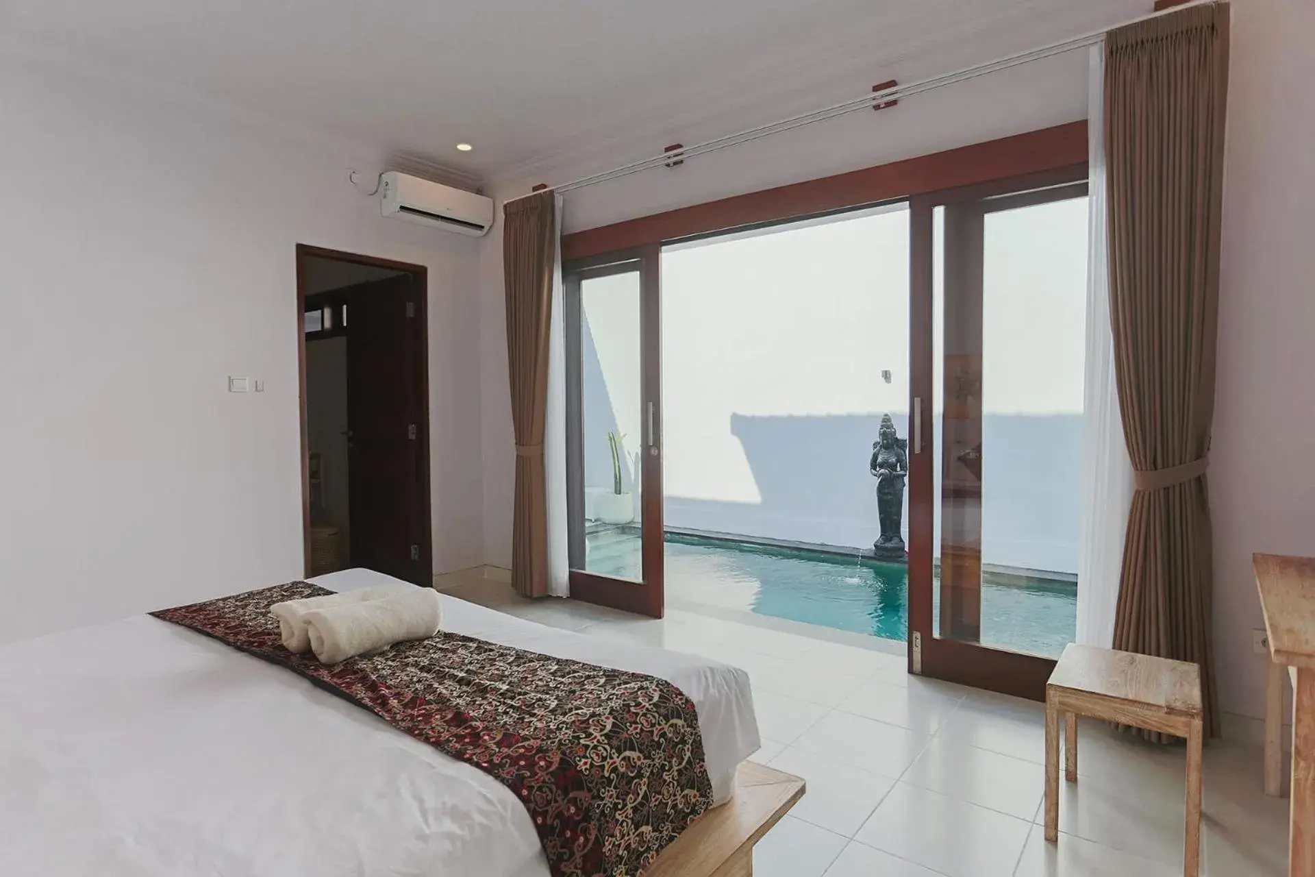 Bed in Maisaba Seminyak Loft & Villas Bed in Maisaba Seminyak Loft & Villas