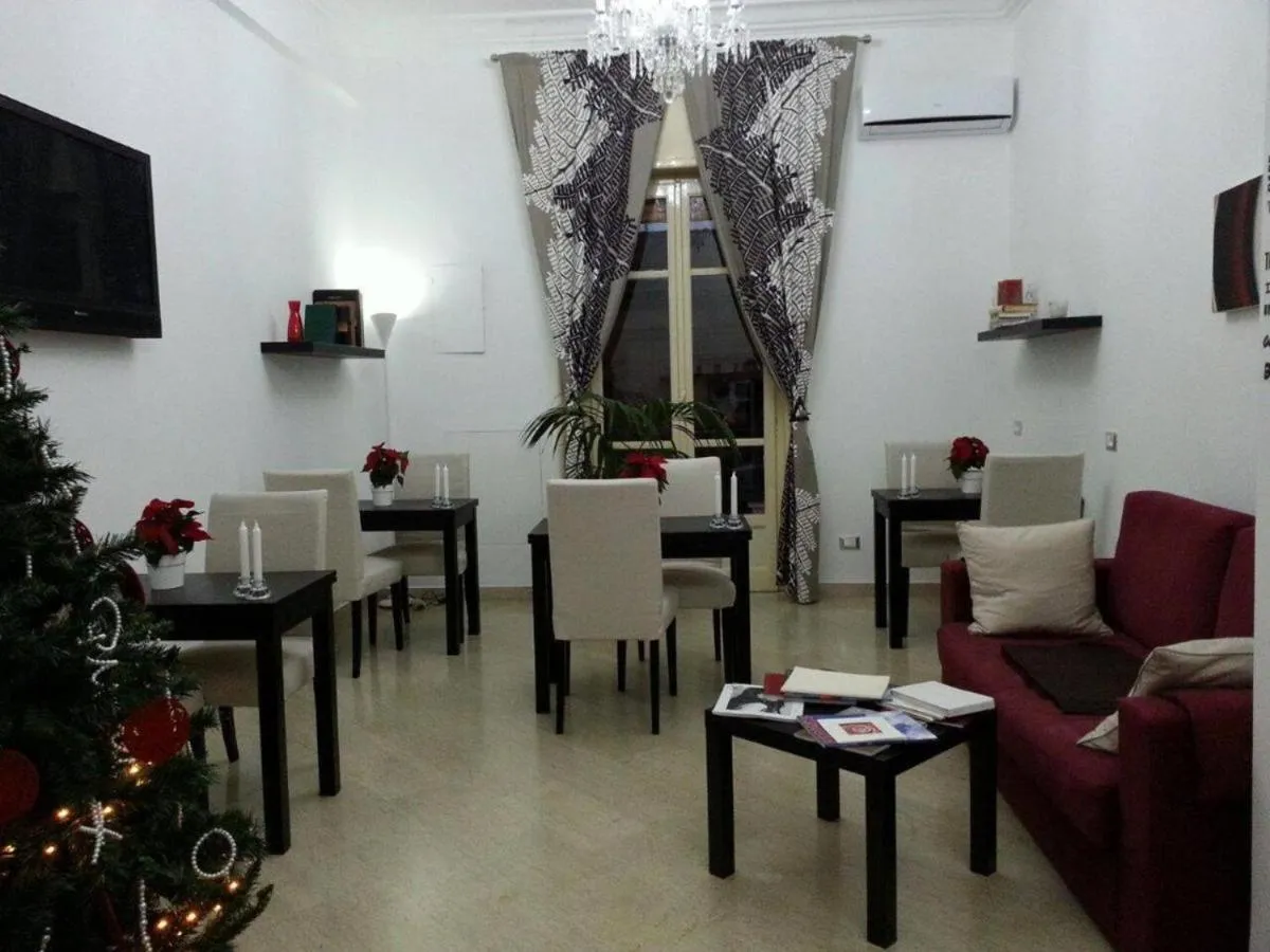 Communal lounge/ TV room in B&B Paolo e Mariella