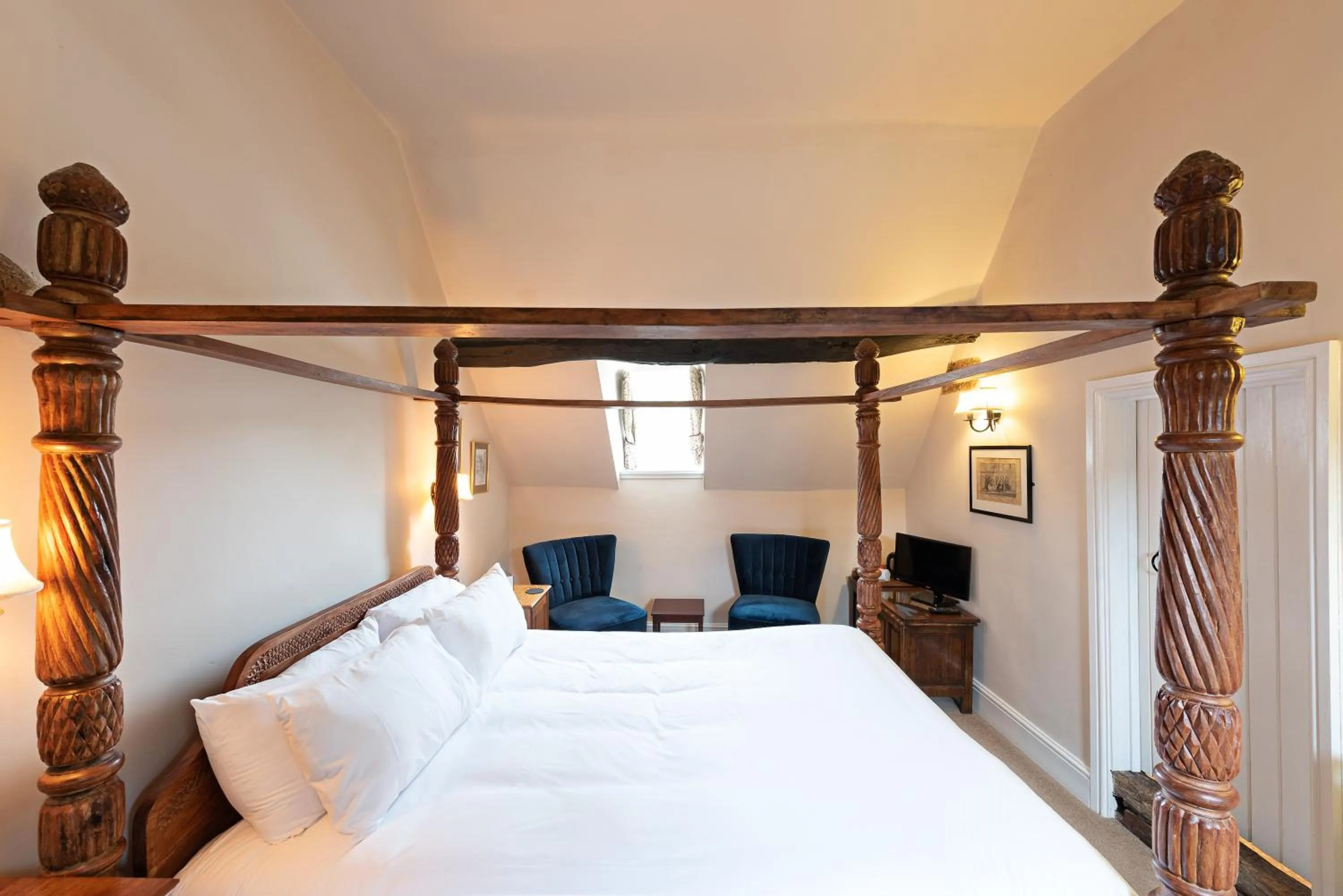 Bed in Corinium Hotel & Restaurant