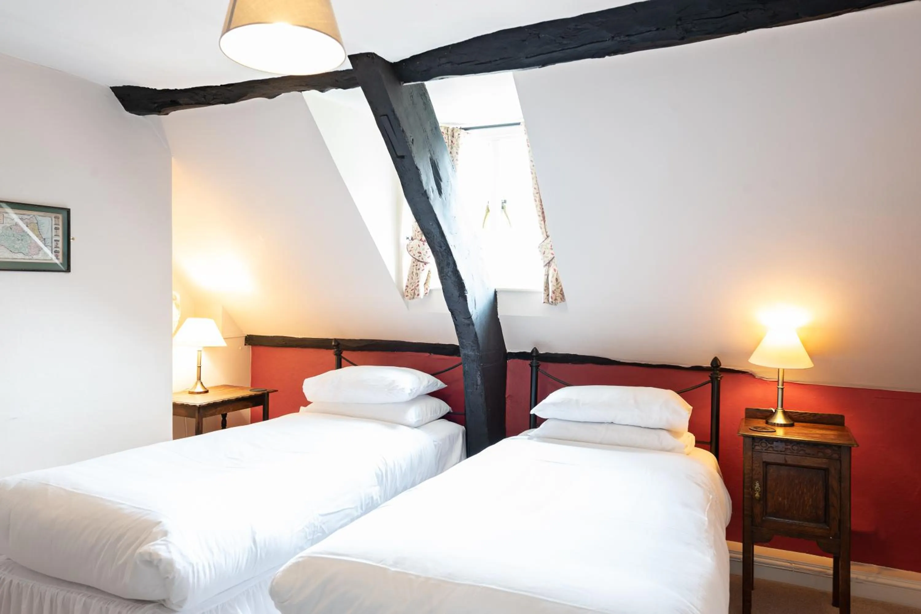 Bed in Corinium Hotel & Restaurant