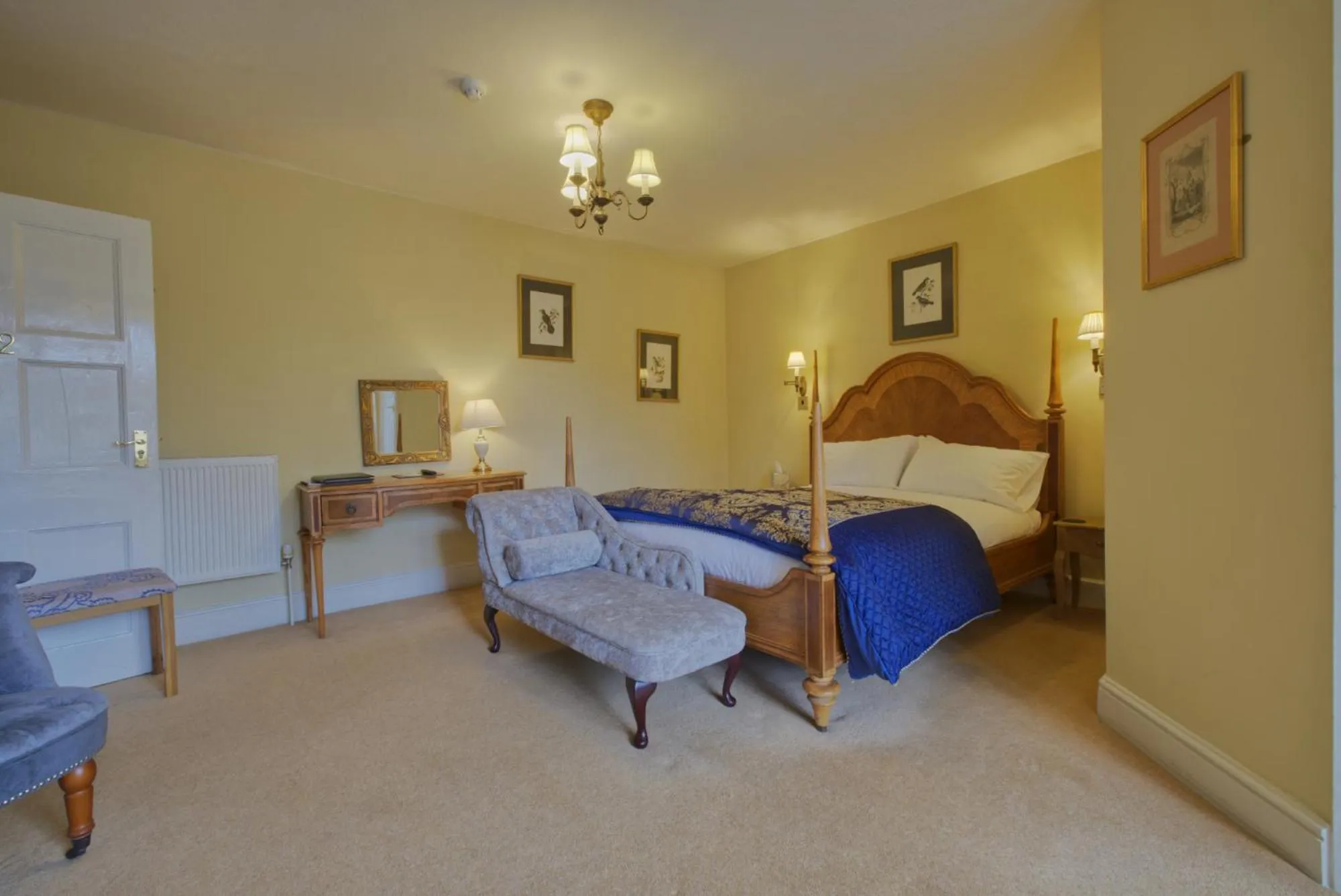 Bed in Corinium Hotel & Restaurant