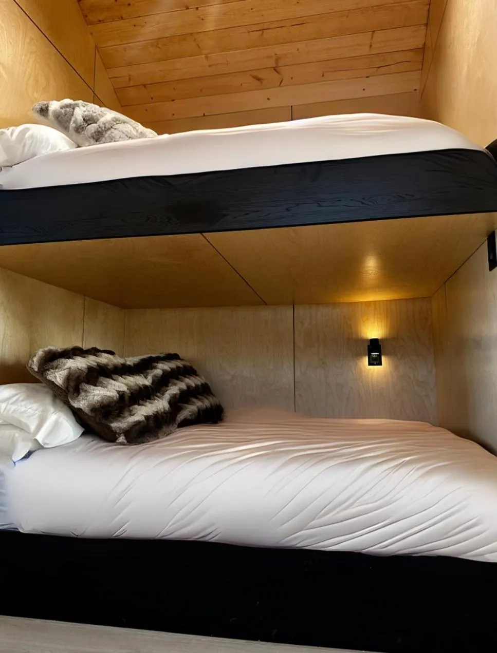 Bed in Yellowstone Peaks Hotel