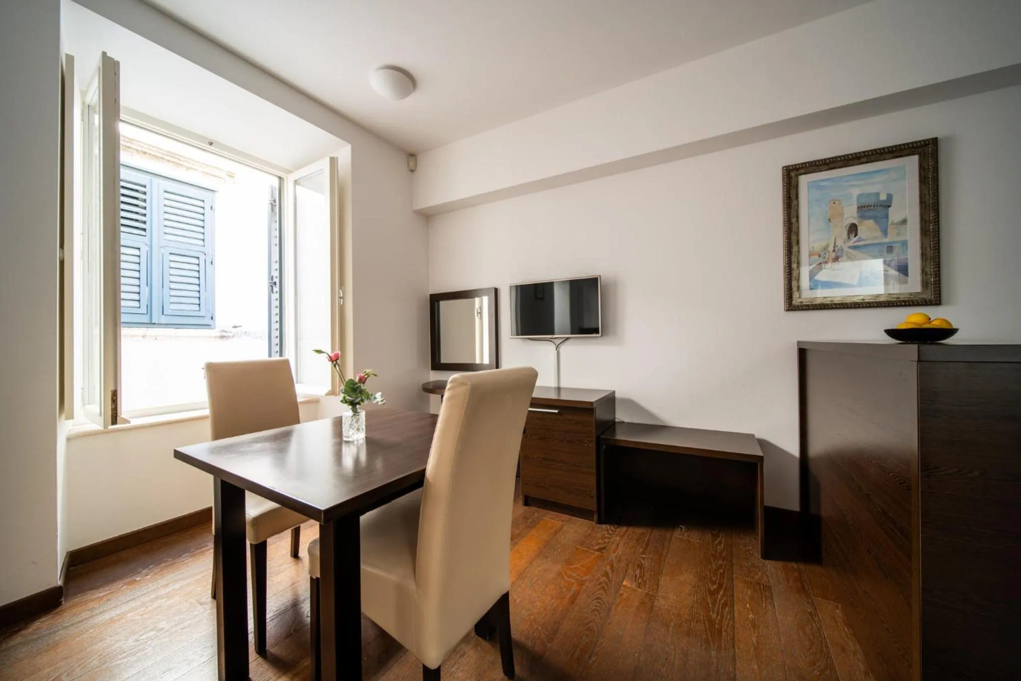 TV and multimedia in Celenga Apartments with free offsite parking