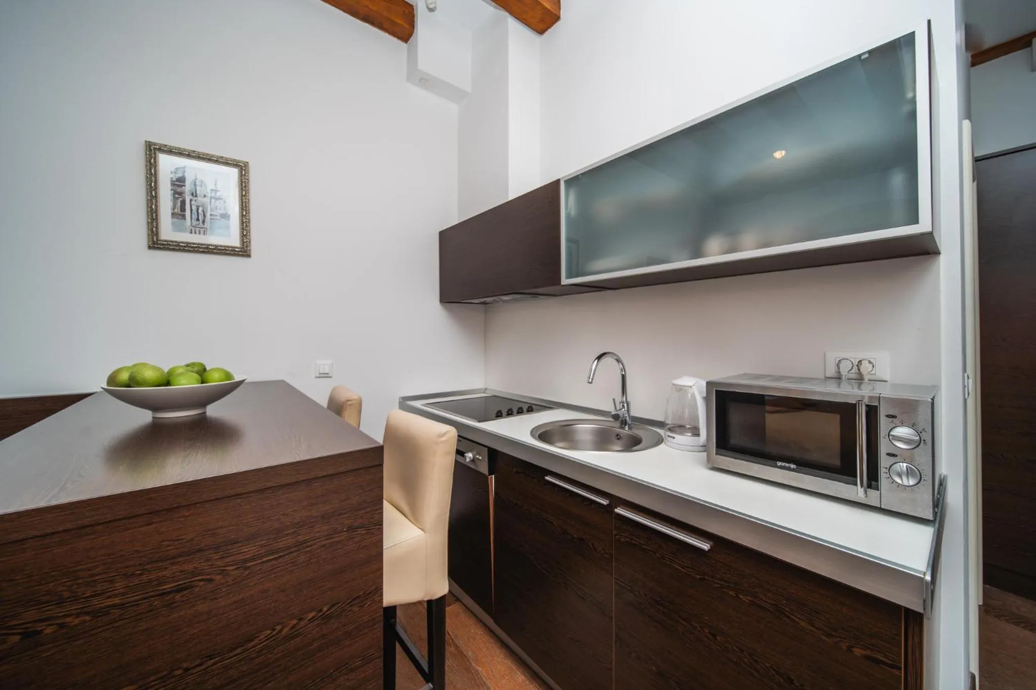 Kitchen or kitchenette in Celenga Apartments with free offsite parking