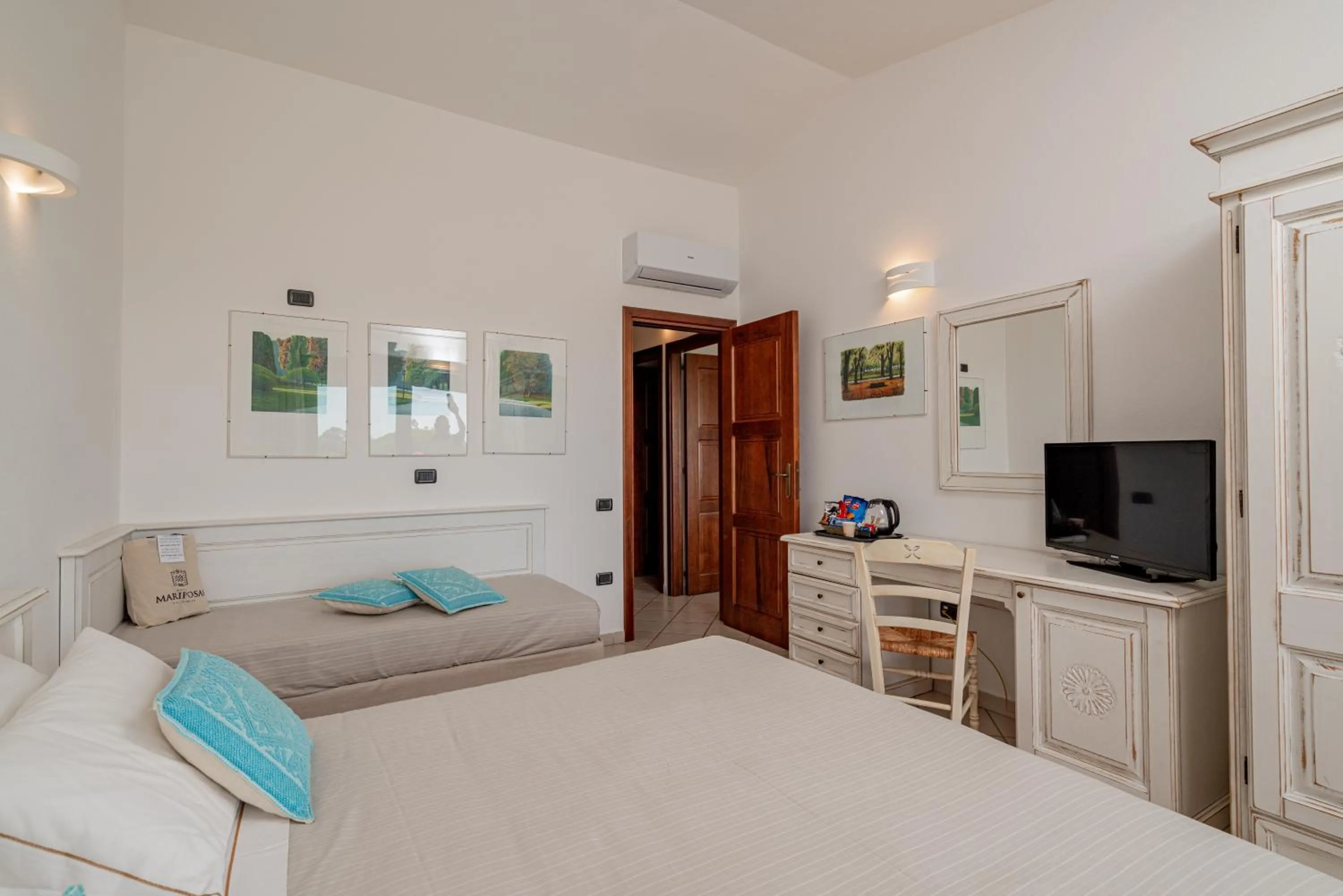 Bed in Hotel Mariposas