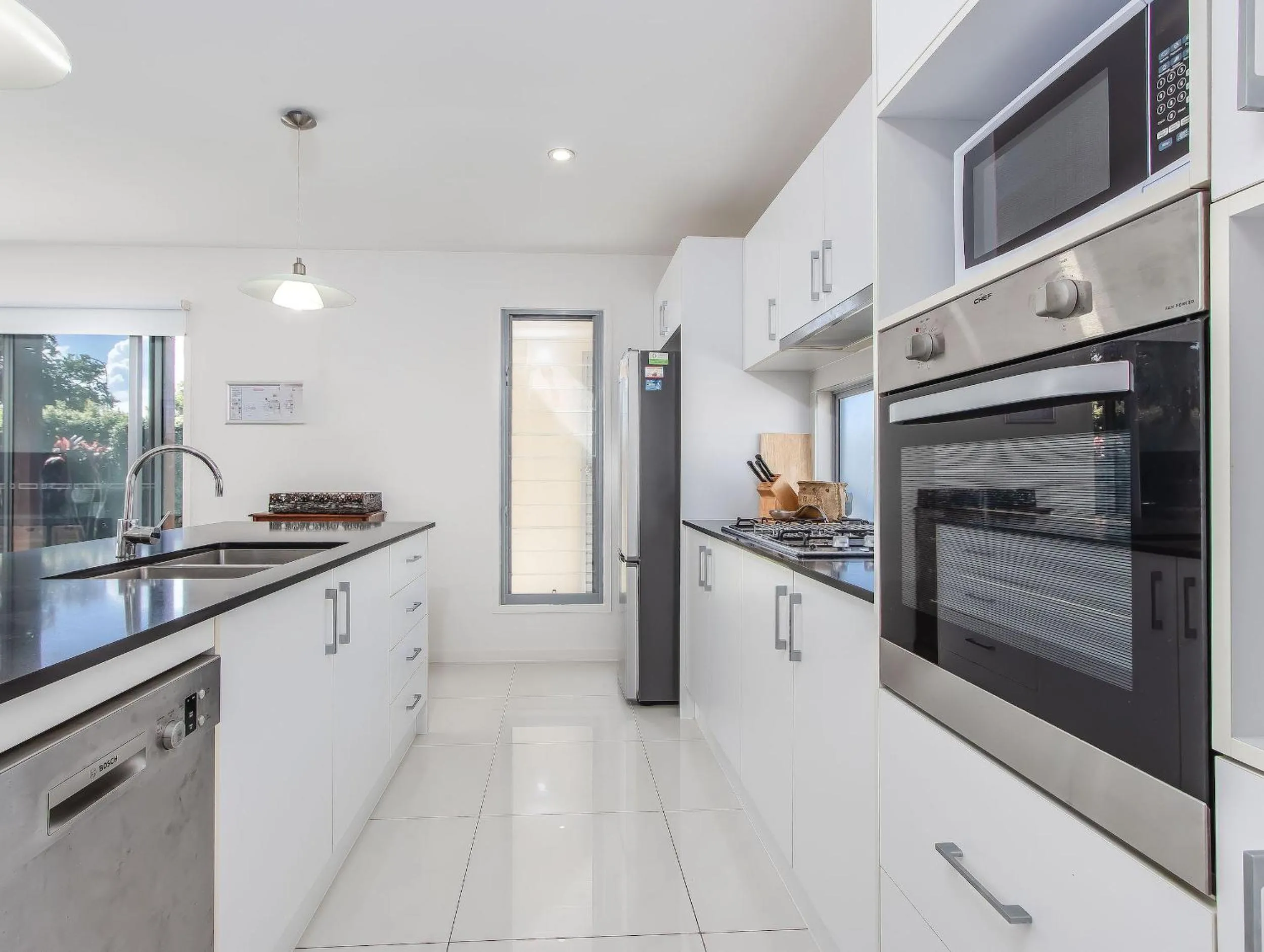 Kitchen or kitchenette in Coastal Charm on Casuarina Way
