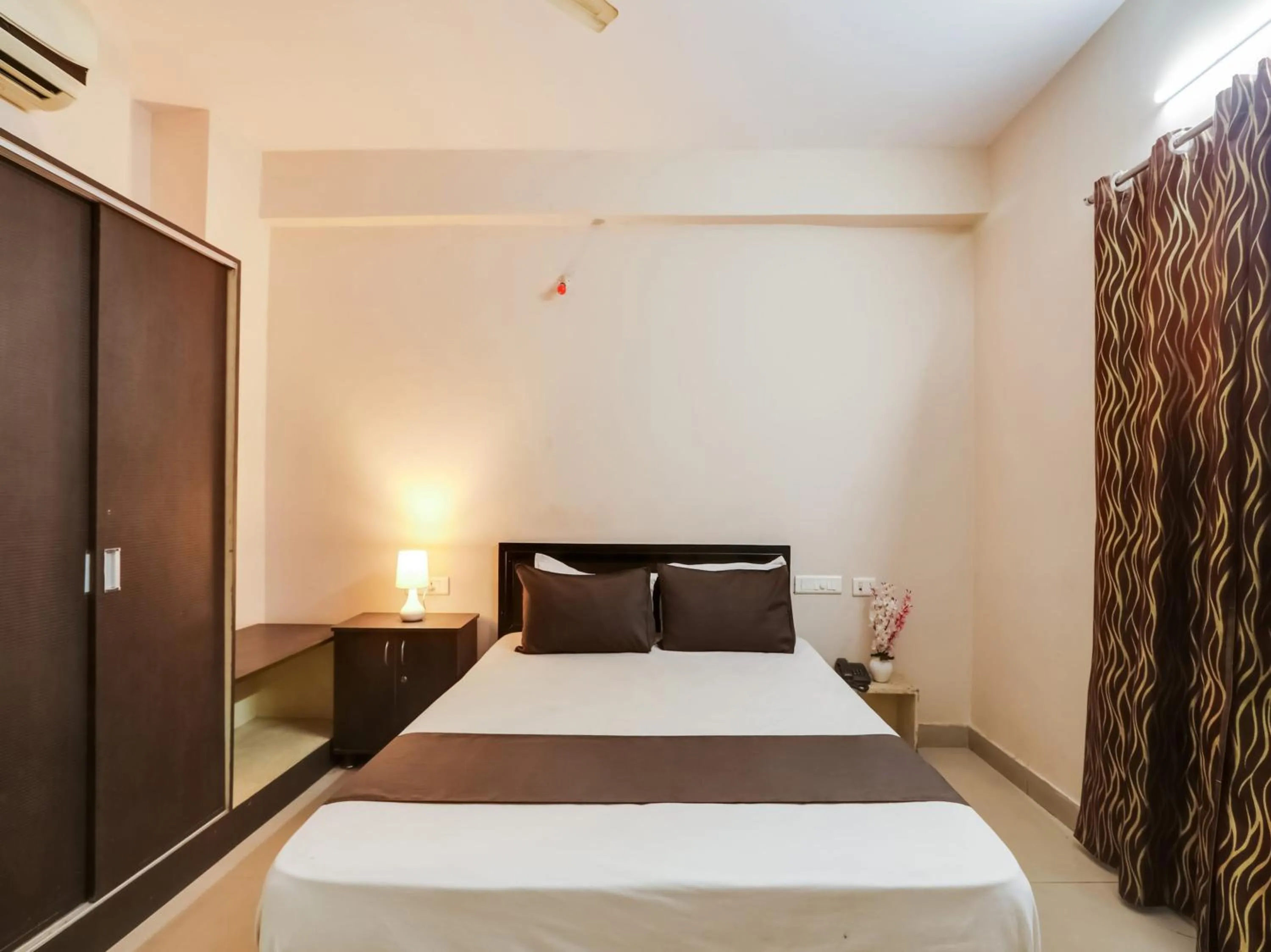 Bedroom in Hotel O Srinivasa Grand