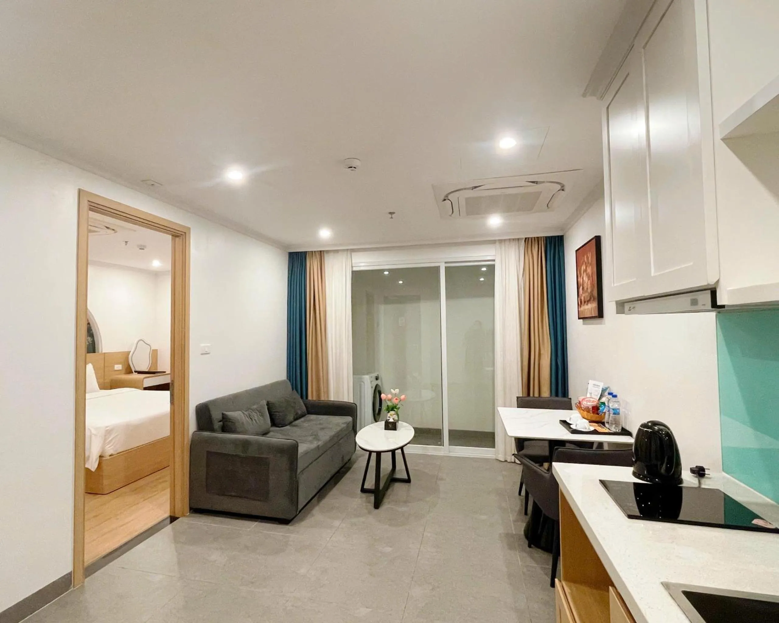 Kitchen or kitchenette, Bed in The Yen Residences Danang