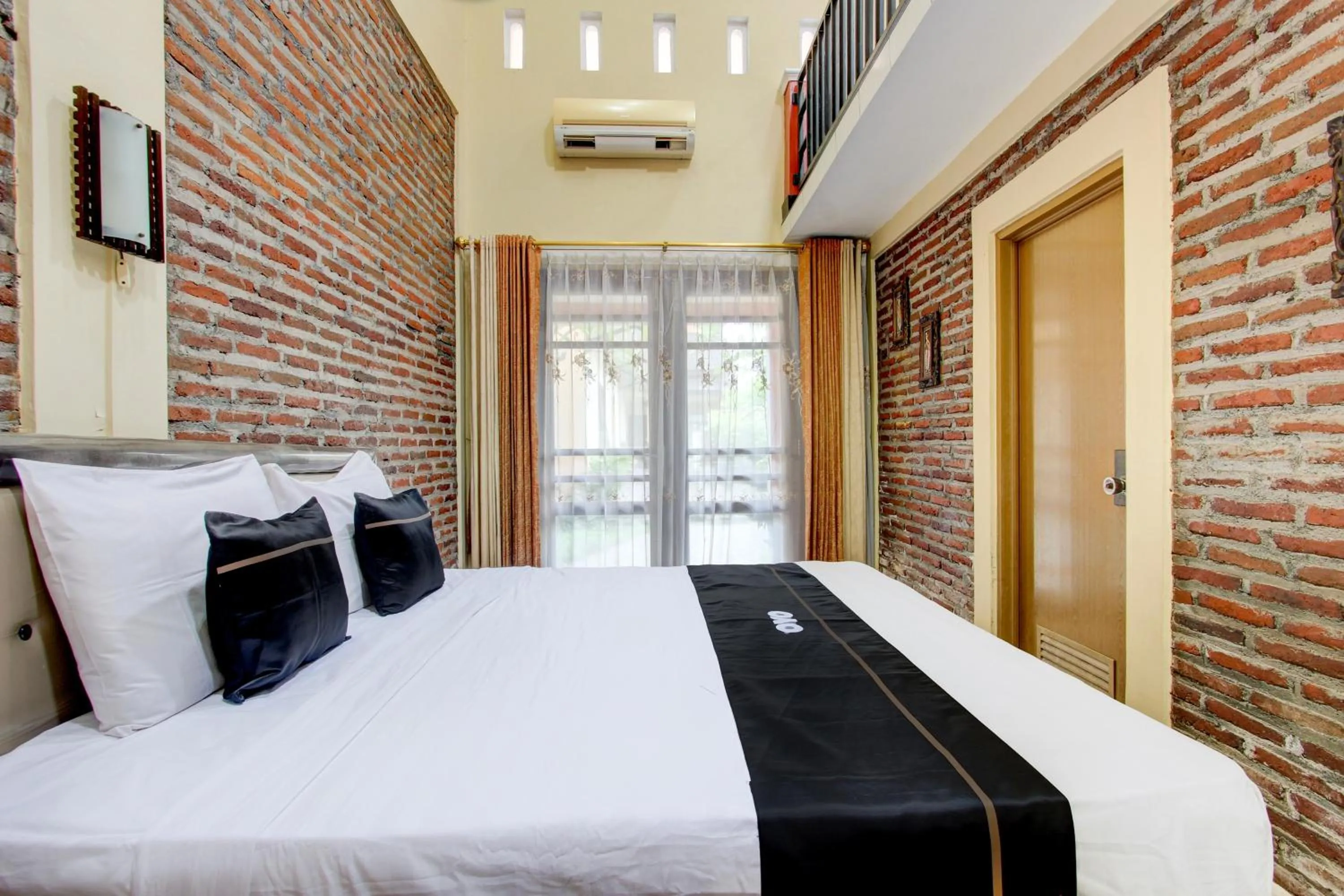 Bedroom in Capital O 93716 Family Guesthouse Syariah