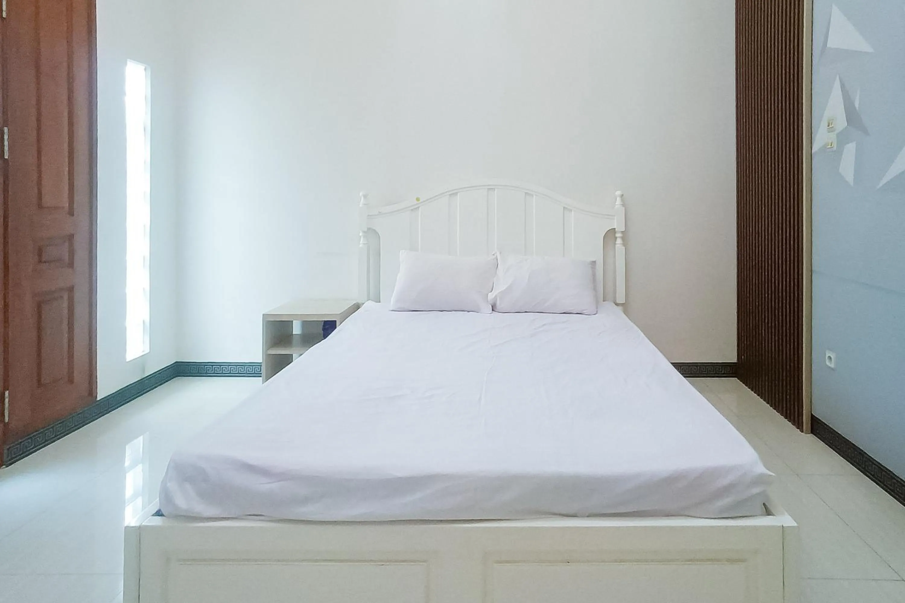 Standard Double Room with Shared Bathroom in Vj Sweethome Syariah Near GOR Turida