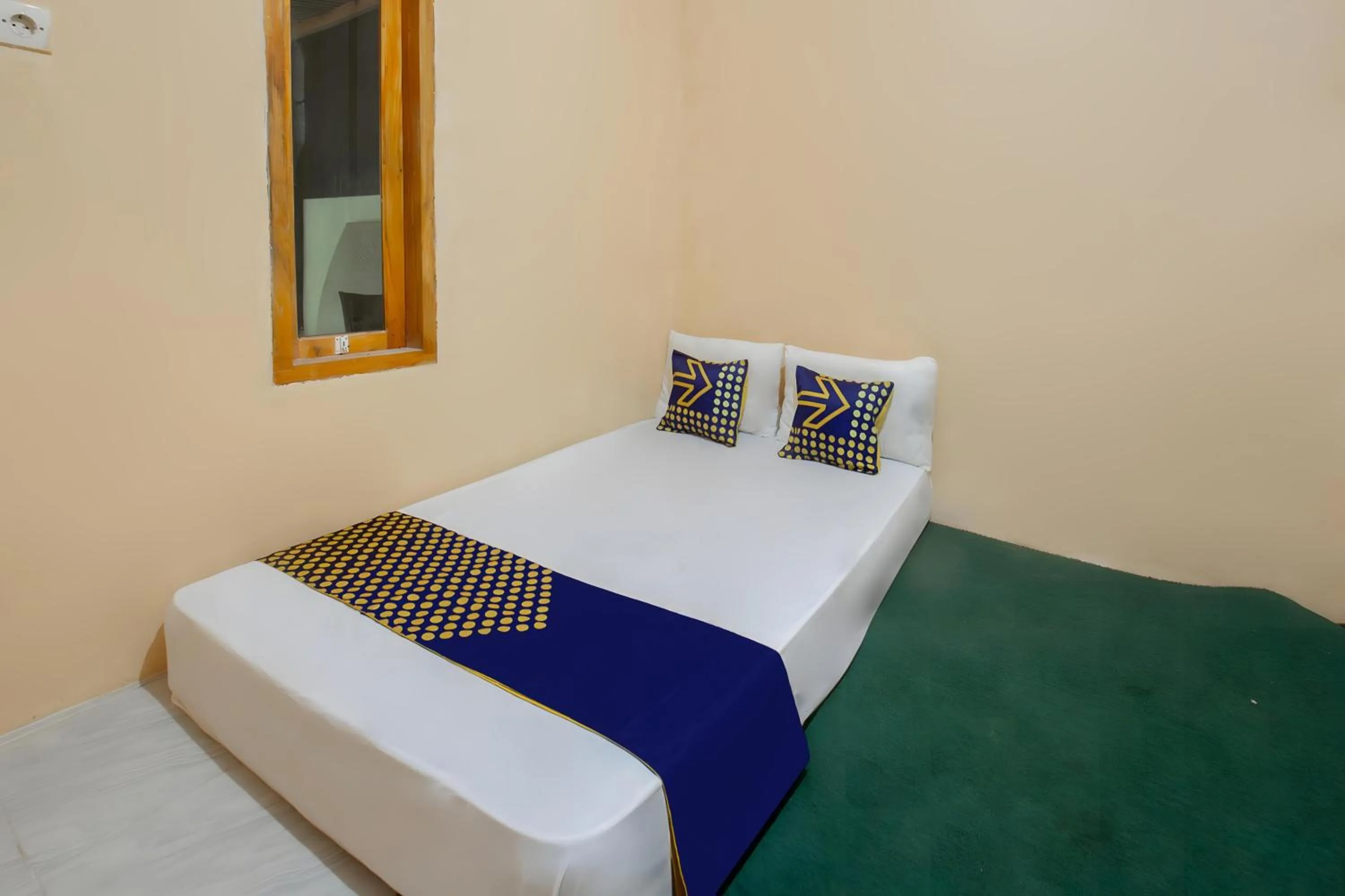 Bedroom, Bed in SPOT ON 93724 Songgong Homestay