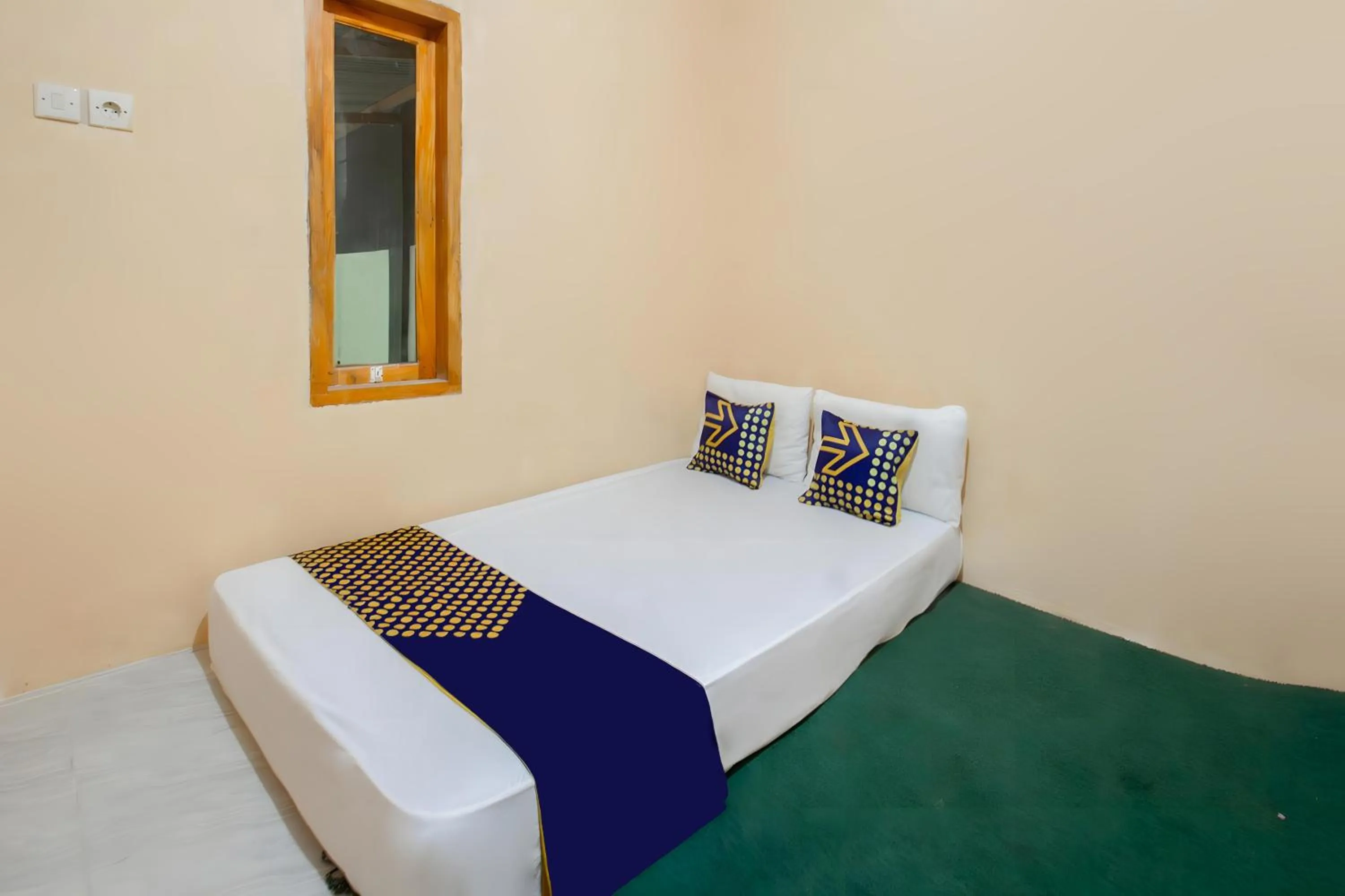 Bedroom, Bed in SPOT ON 93724 Songgong Homestay