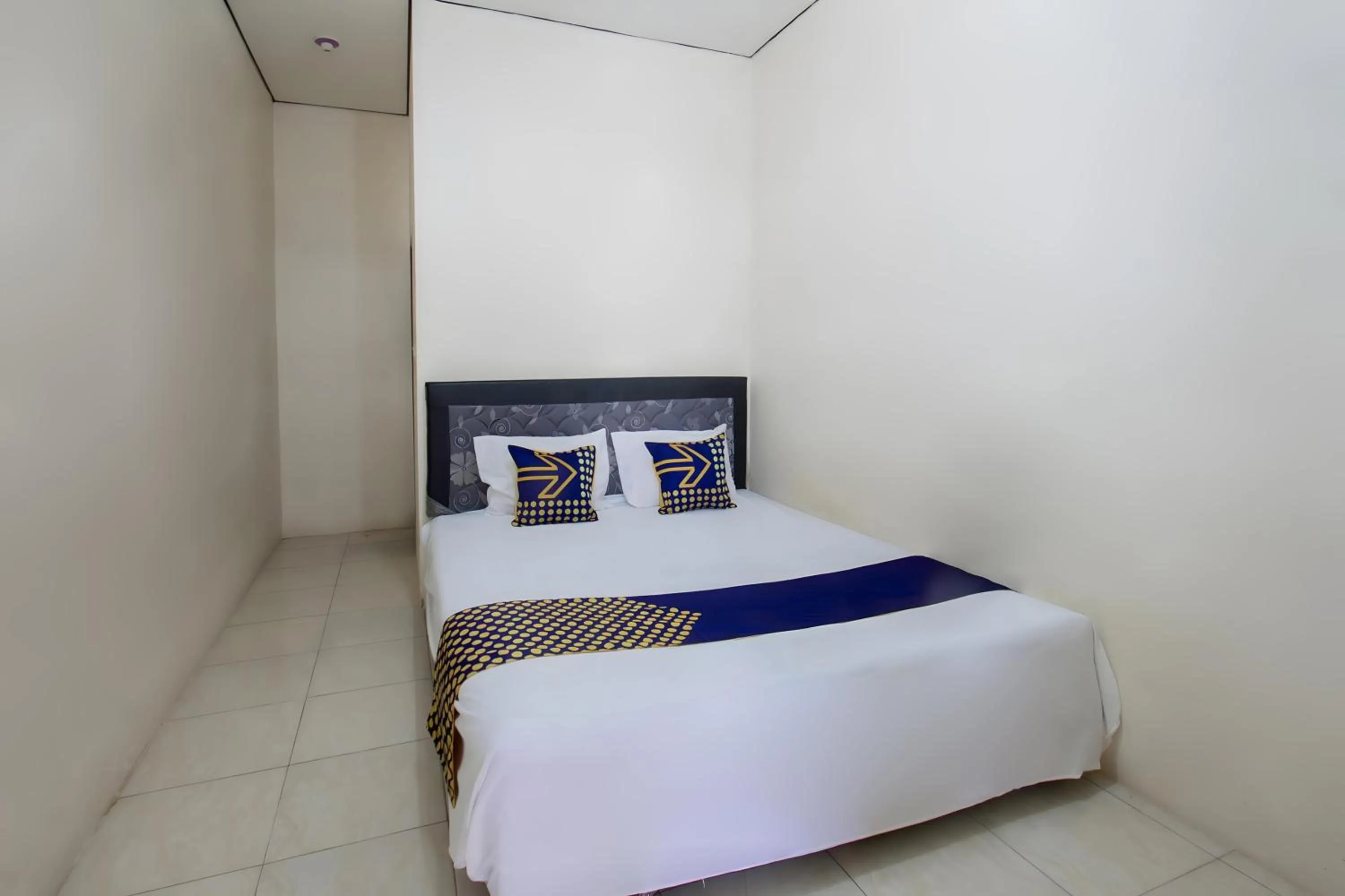 Bedroom, Bed in SPOT ON 93724 Songgong Homestay