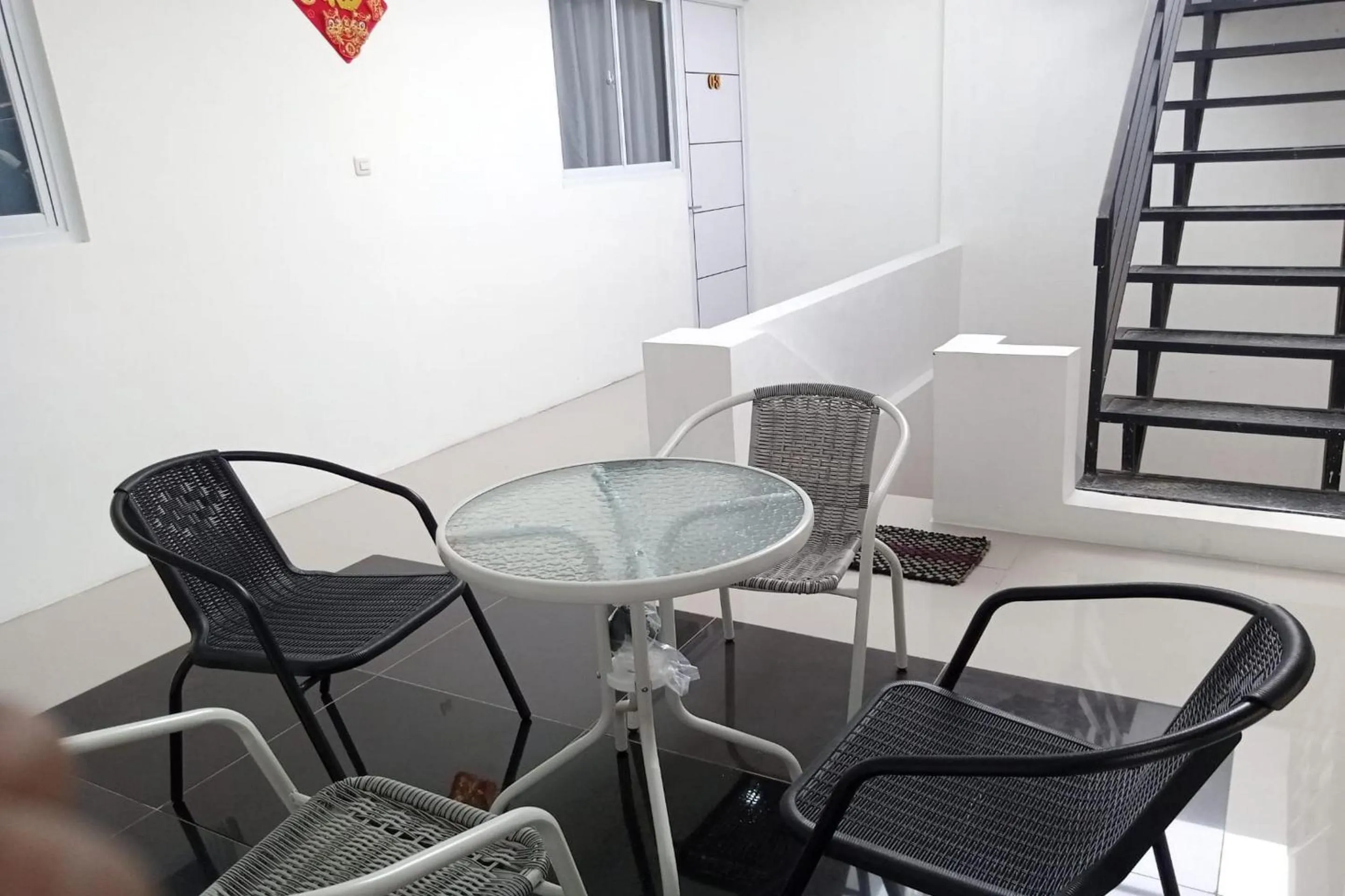 Lobby or reception in Capital O 93728 Guest House Cemara