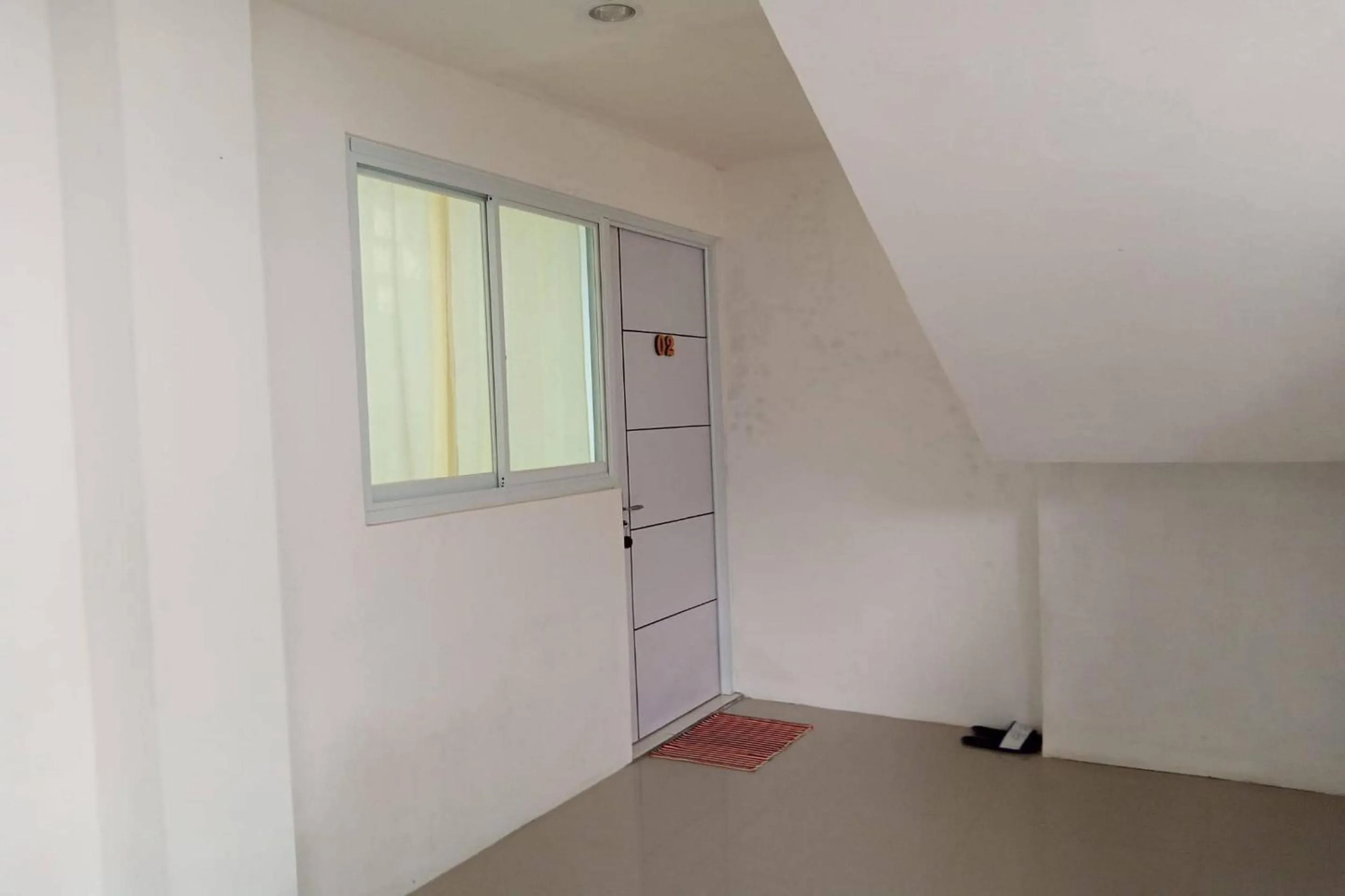 Lobby or reception in Capital O 93728 Guest House Cemara