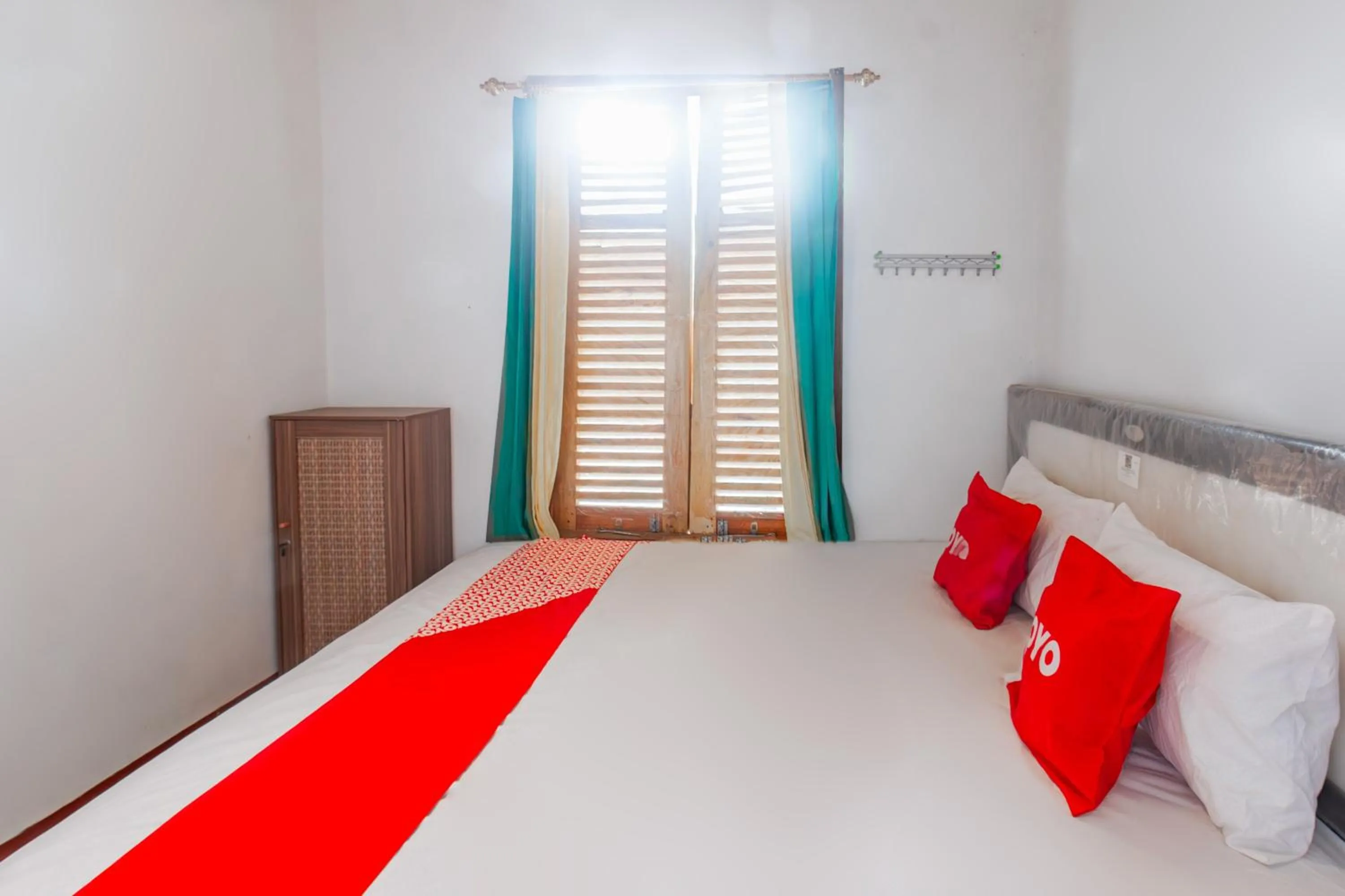 Bedroom in OYO 93729 Radesa Family Homestay