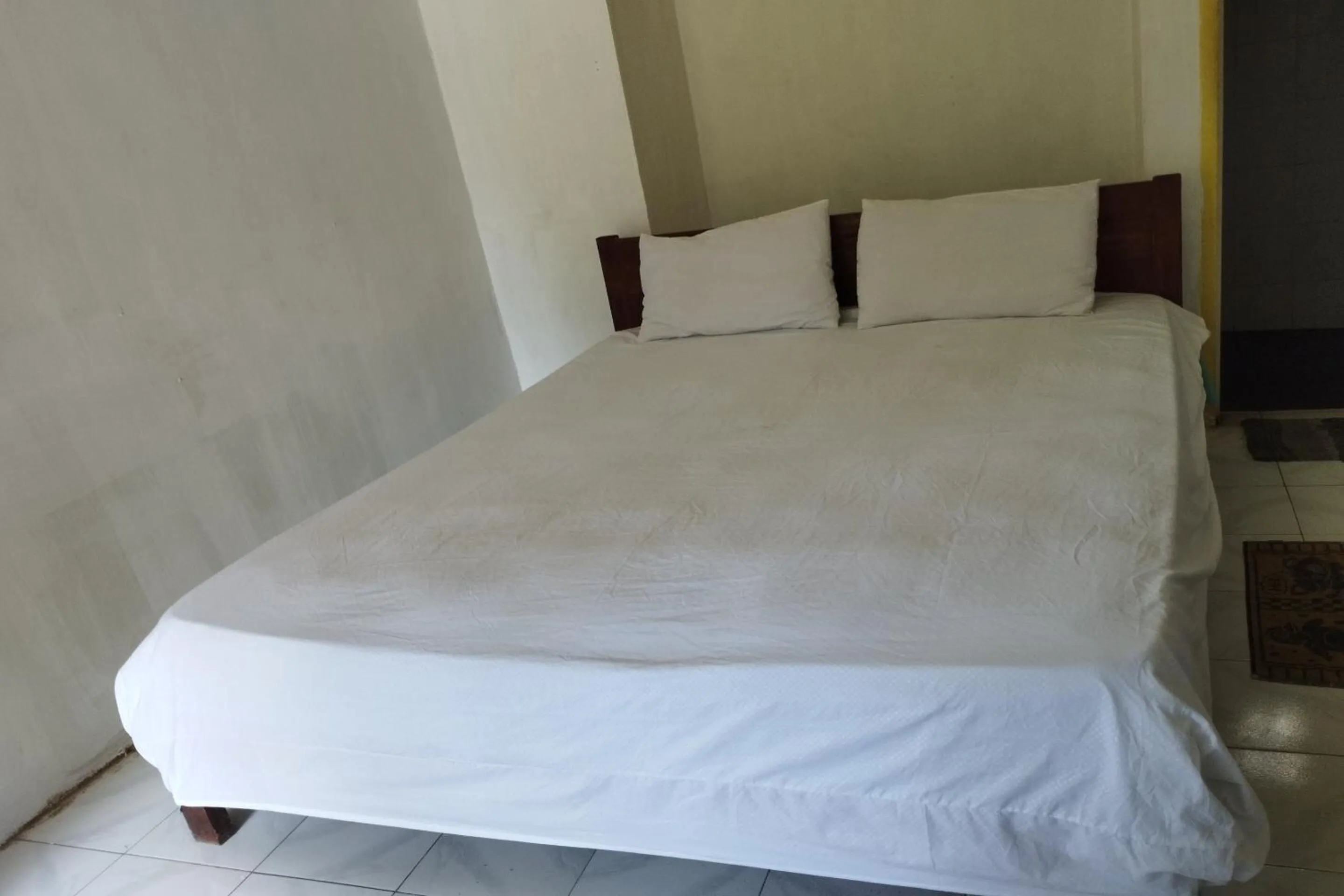 Bedroom, Bed in Hotel O Madame Guesthouse