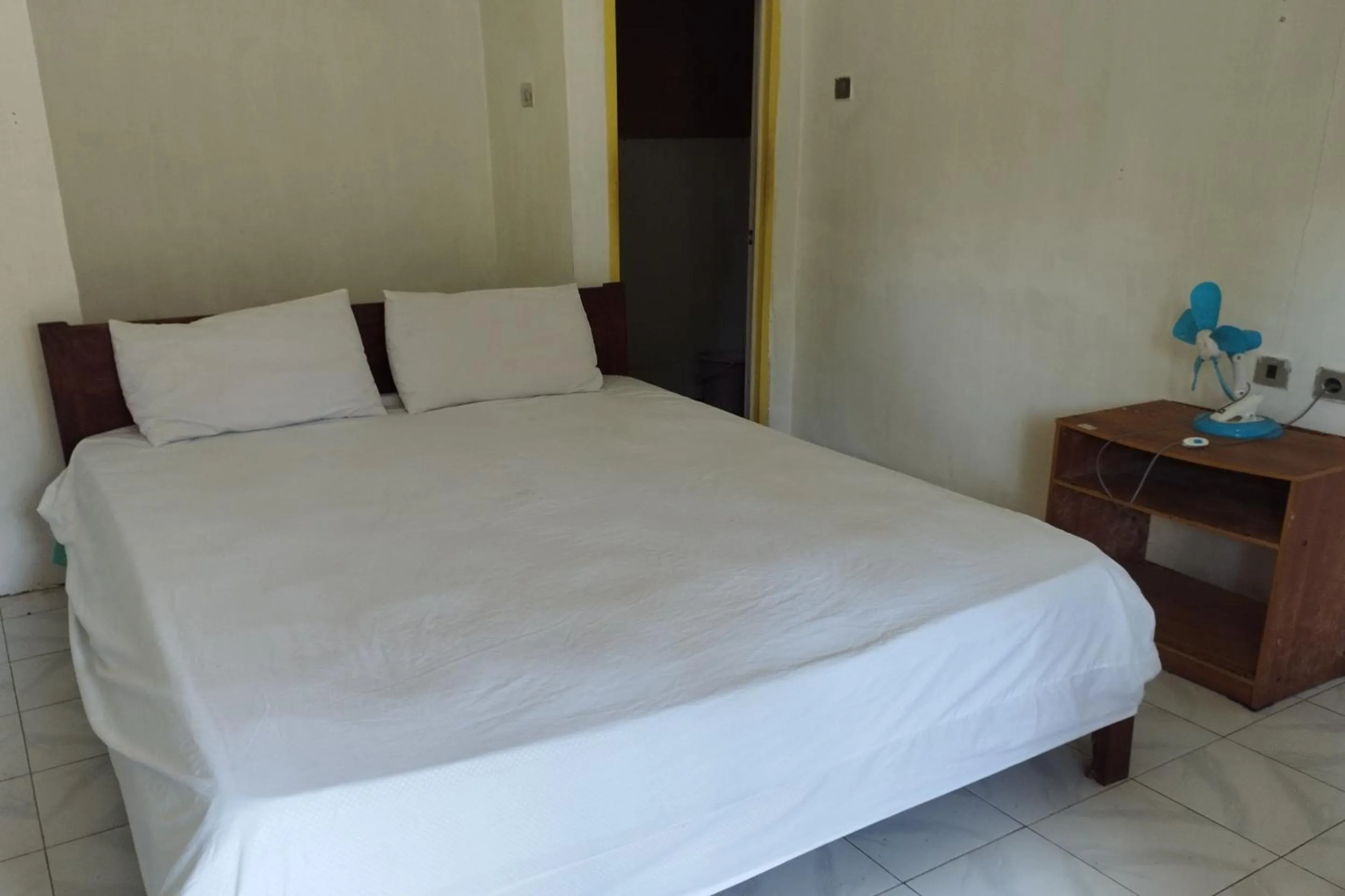 Bedroom, Bed in Hotel O Madame Guesthouse