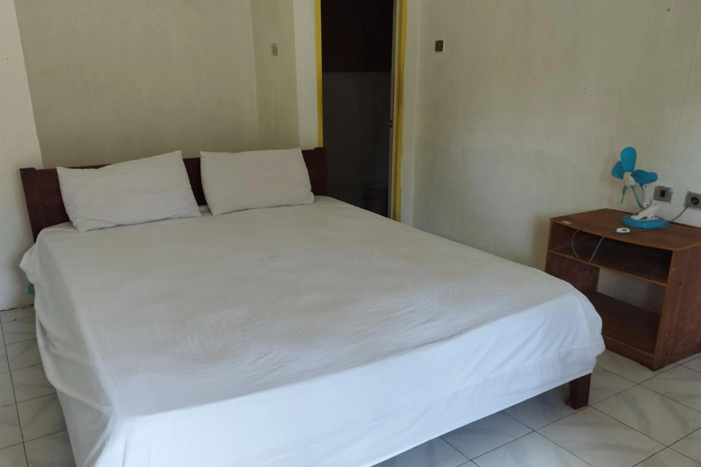 Bedroom, Bed in Hotel O Madame Guesthouse