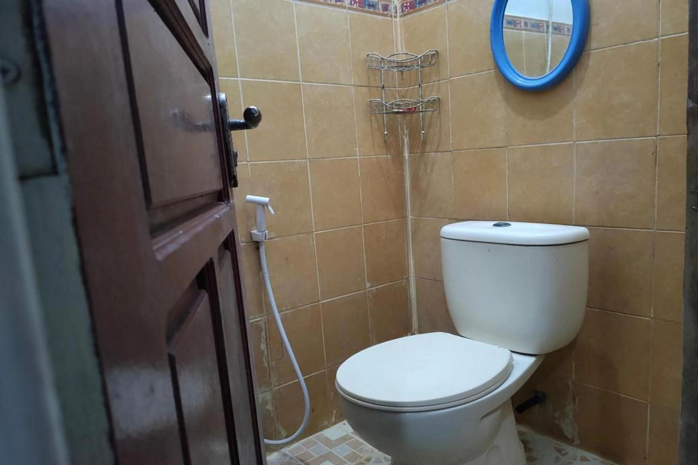 Bathroom in OYO 93756 Qq Kost Near Pantai Kebesaran Beach