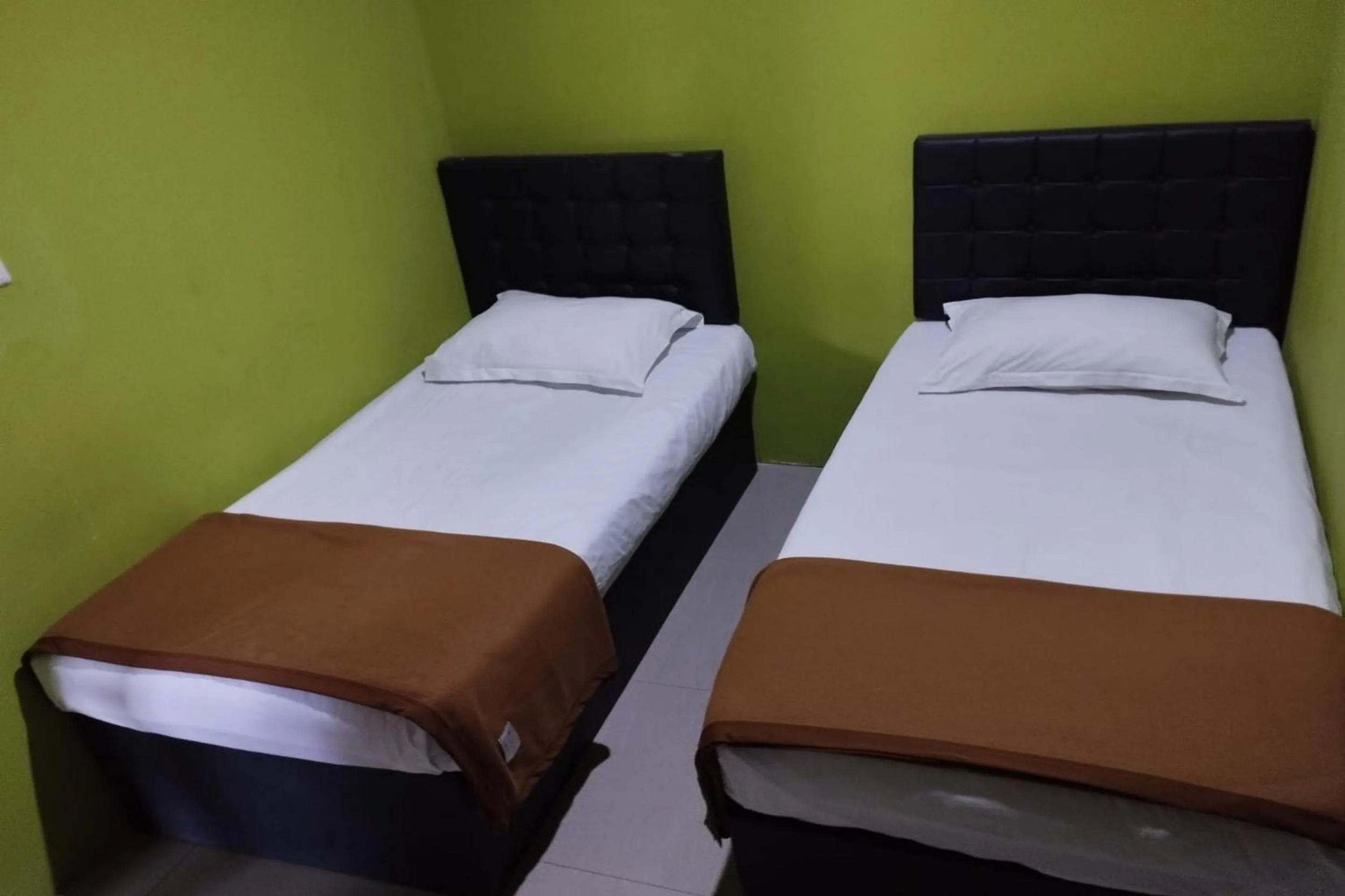 Bedroom, Bed in Hotel O Homestay Citra